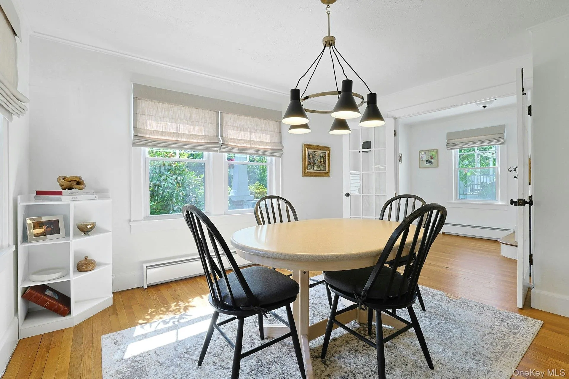Dining Room beaming with natural light. Custom shades throughout the home. Dining Room beaming with natural light. Custom shades throughout the home.