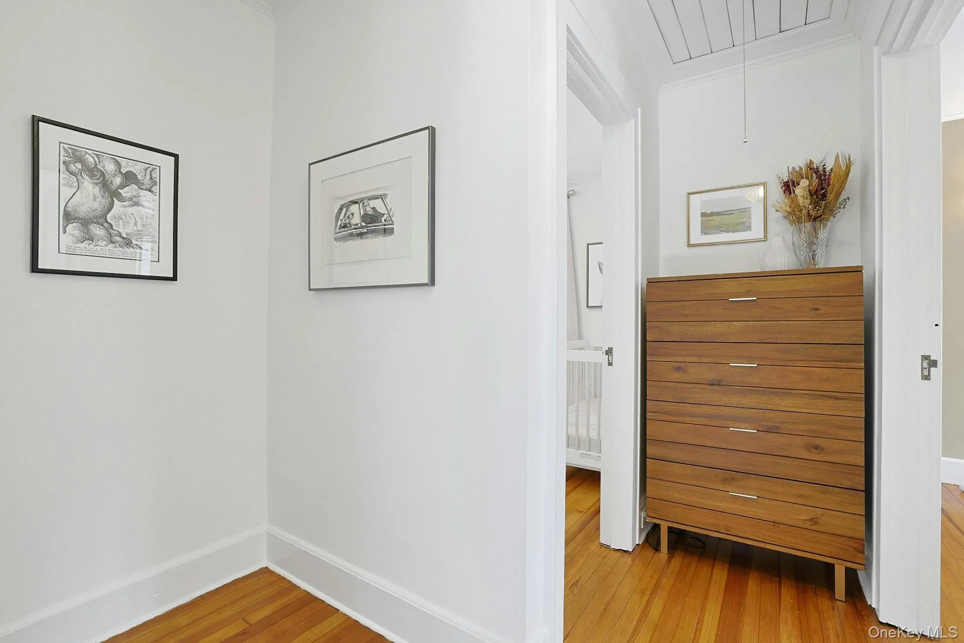 Second floor hallway with enough room for a dresser or home office space. Second floor hallway with enough room for a dresser or home office space.