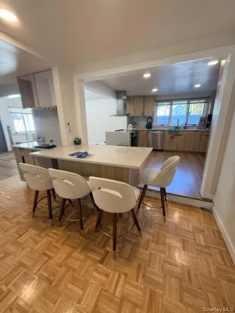 Dining room featuring recessed lighting and baseboards Dining room featuring recessed lighting and baseboards