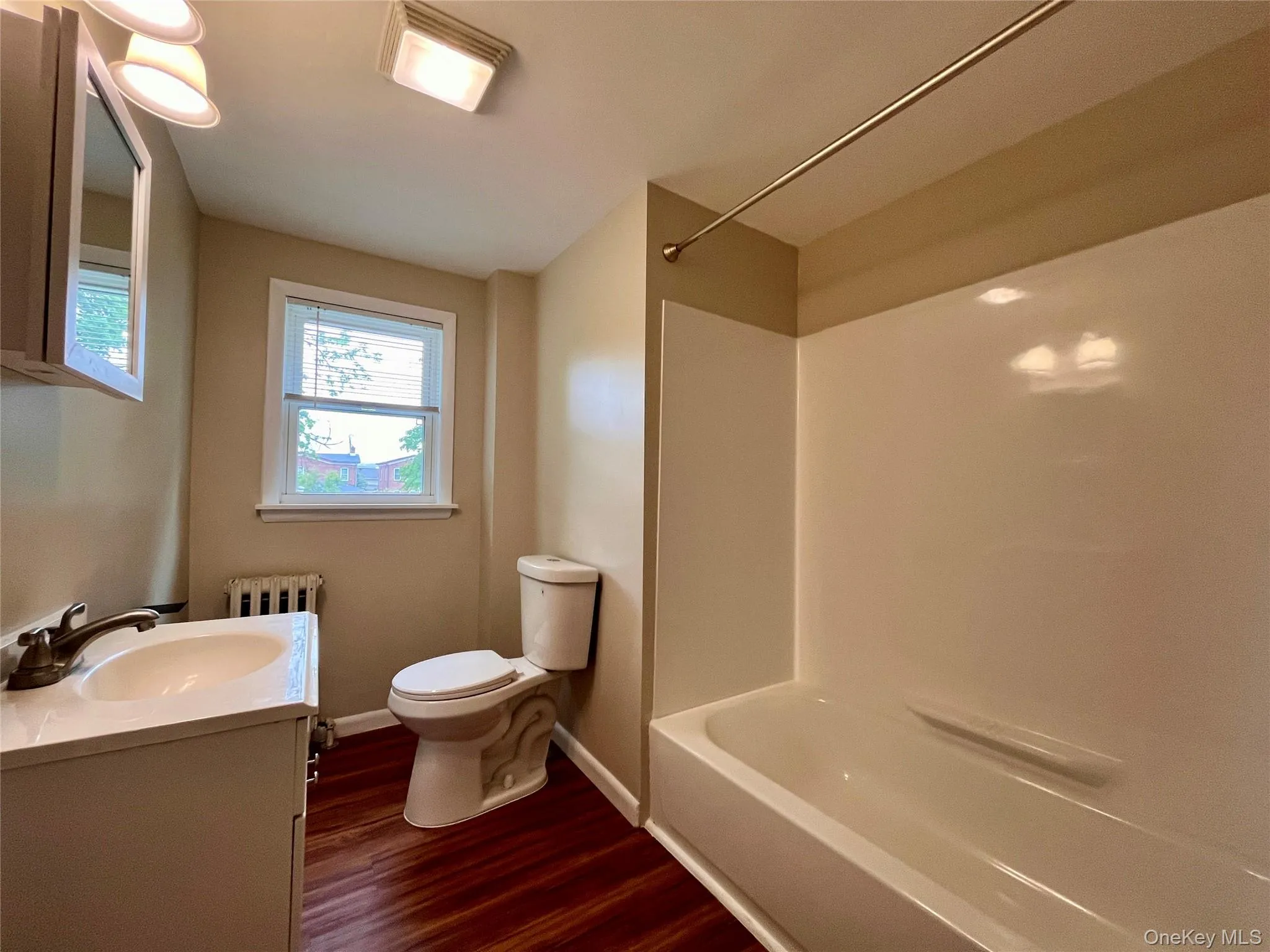 Full bath with new tub and surround is off the primary bedroom Full bath with new tub and surround is off the primary bedroom