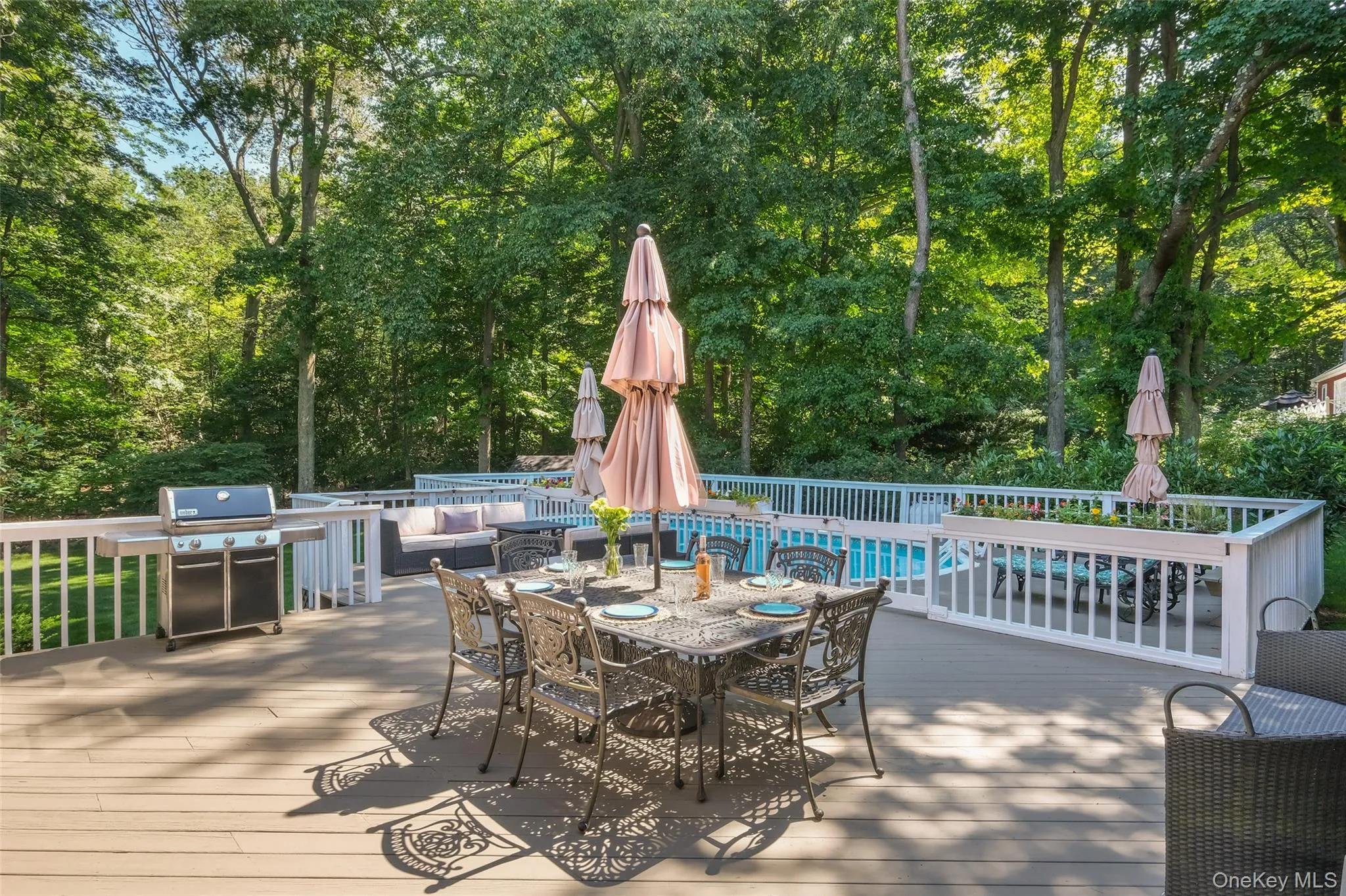 Enjoy summer on the large deck and fully fenced in heated pool overlooking the pristinely flat and private backyard Enjoy summer on the large deck and fully fenced in heated pool overlooking the pristinely flat and private backyard