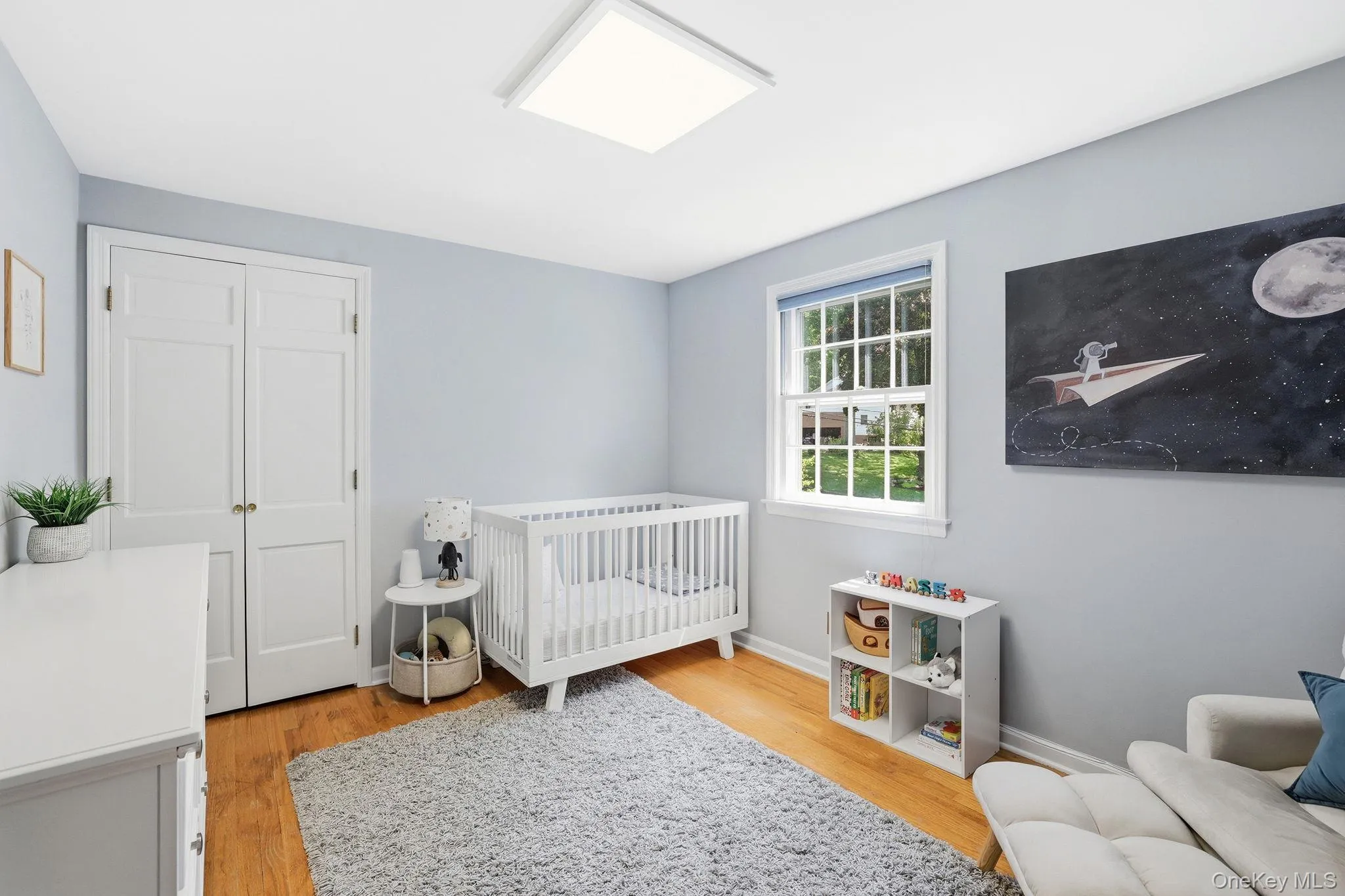 Third bedroom with hardwood floors Third bedroom with hardwood floors