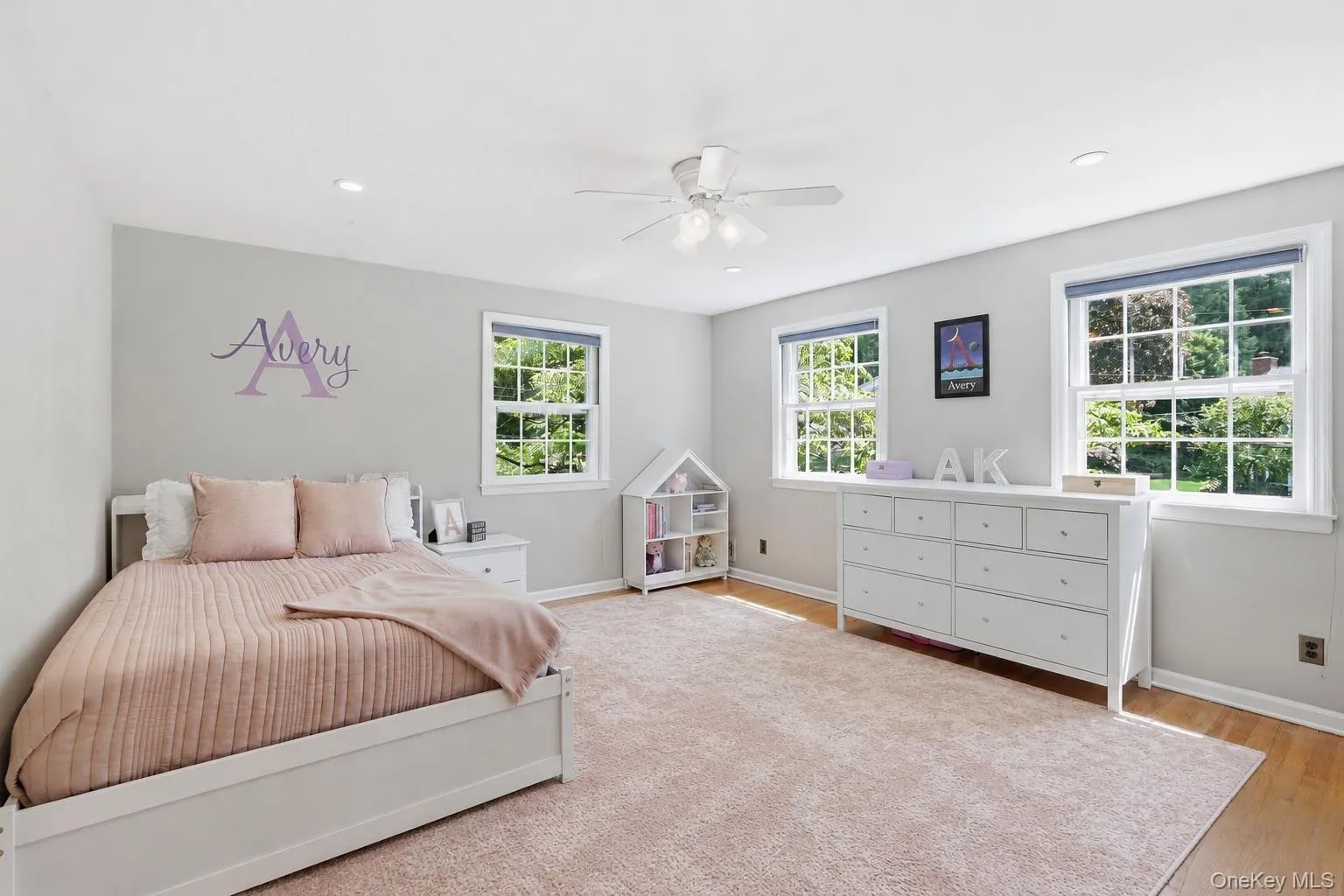 Second bedroom with hardwood floors and dual exposure Second bedroom with hardwood floors and dual exposure