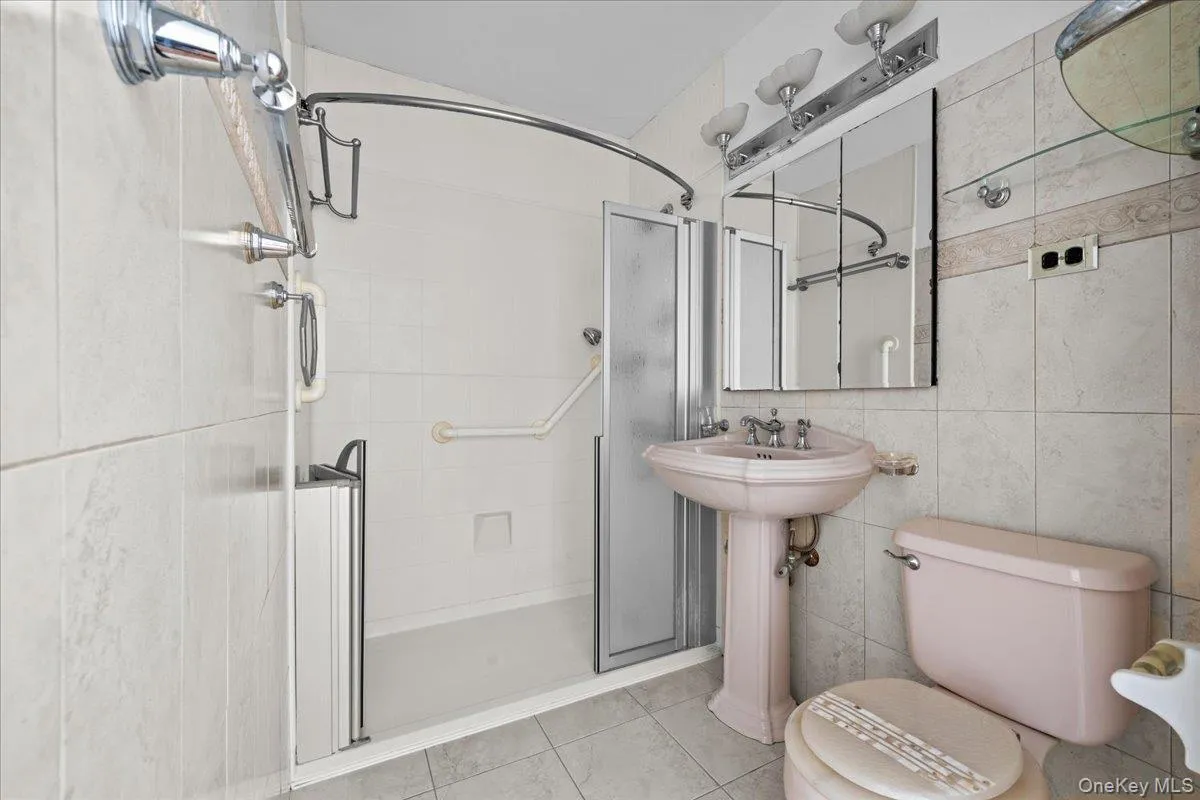 Updated bathroom with walk-in shower Updated bathroom with walk-in shower