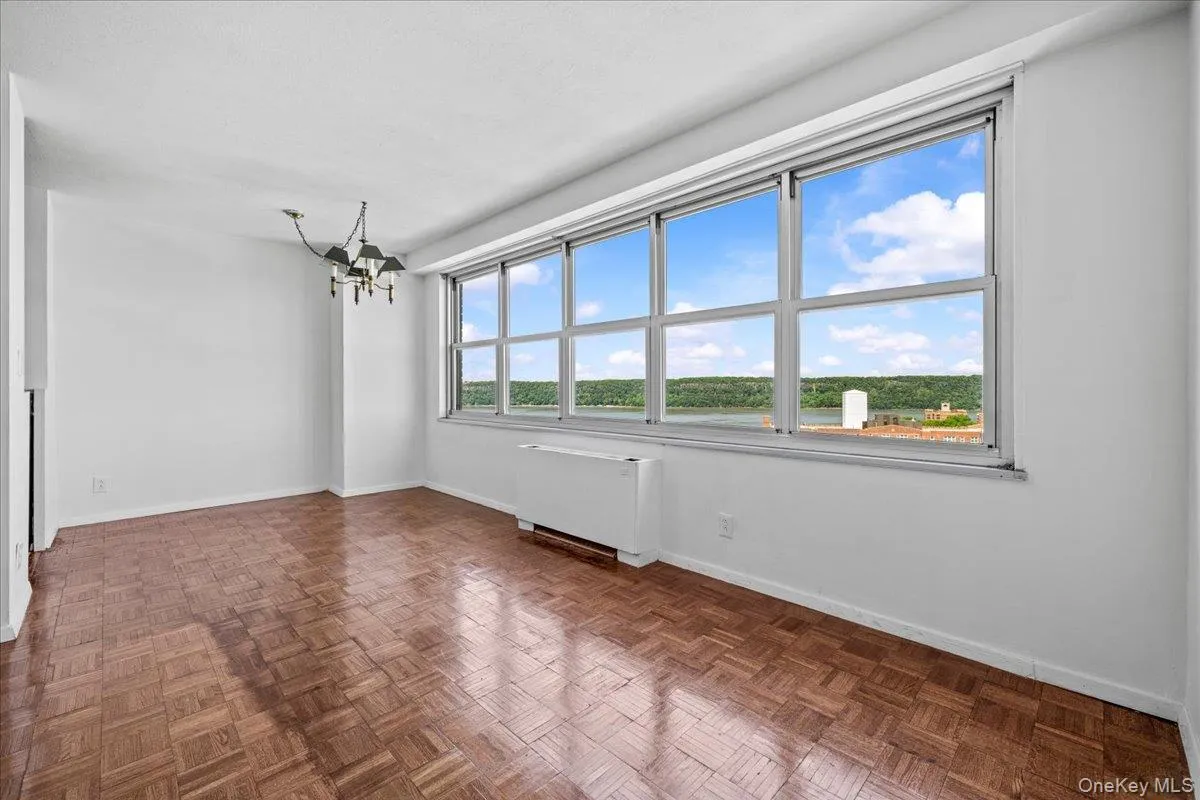 Dining area with walls of windows facing west Dining area with walls of windows facing west