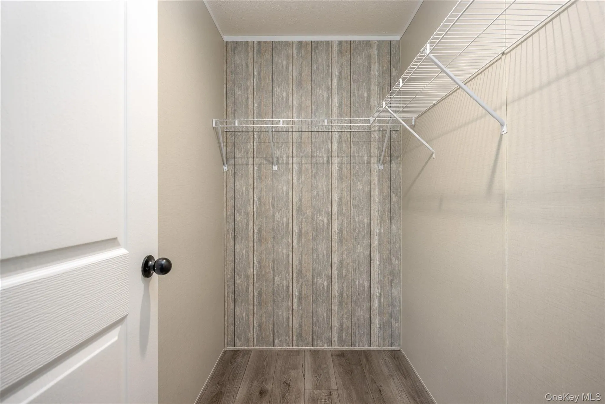 Walk-in closet in the Primary Bedroom Walk-in closet in the Primary Bedroom