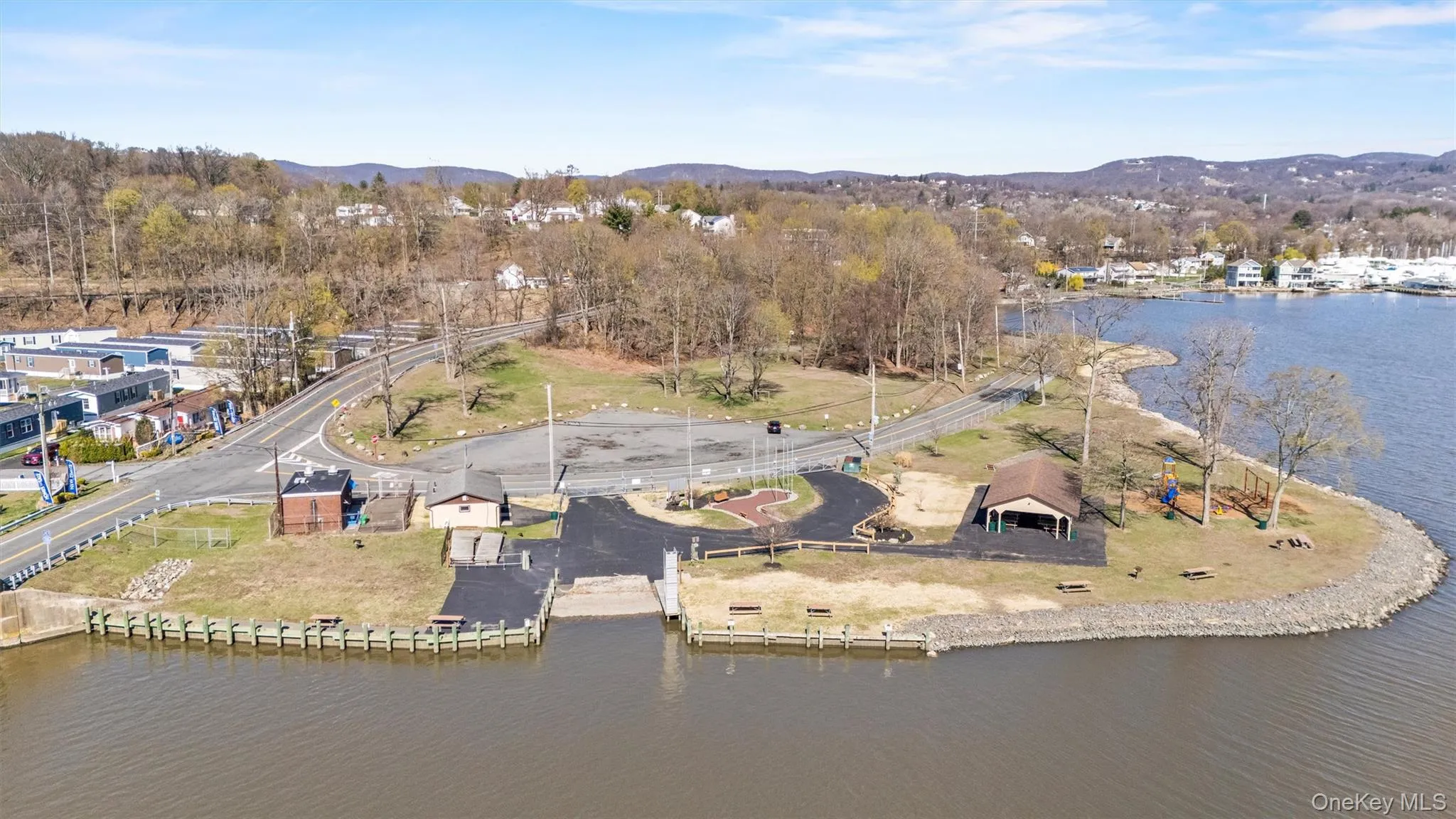 Drone / aerial view with a water and mountain view Drone / aerial view with a water and mountain view