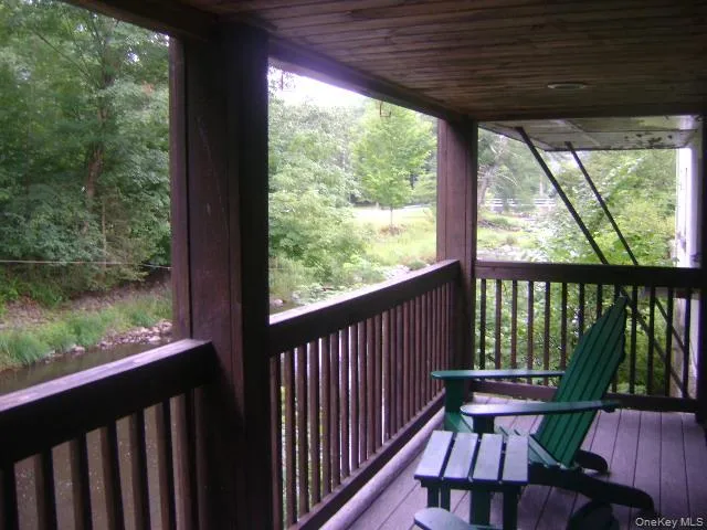 Wooden terrace with a wooded view Wooden terrace with a wooded view
