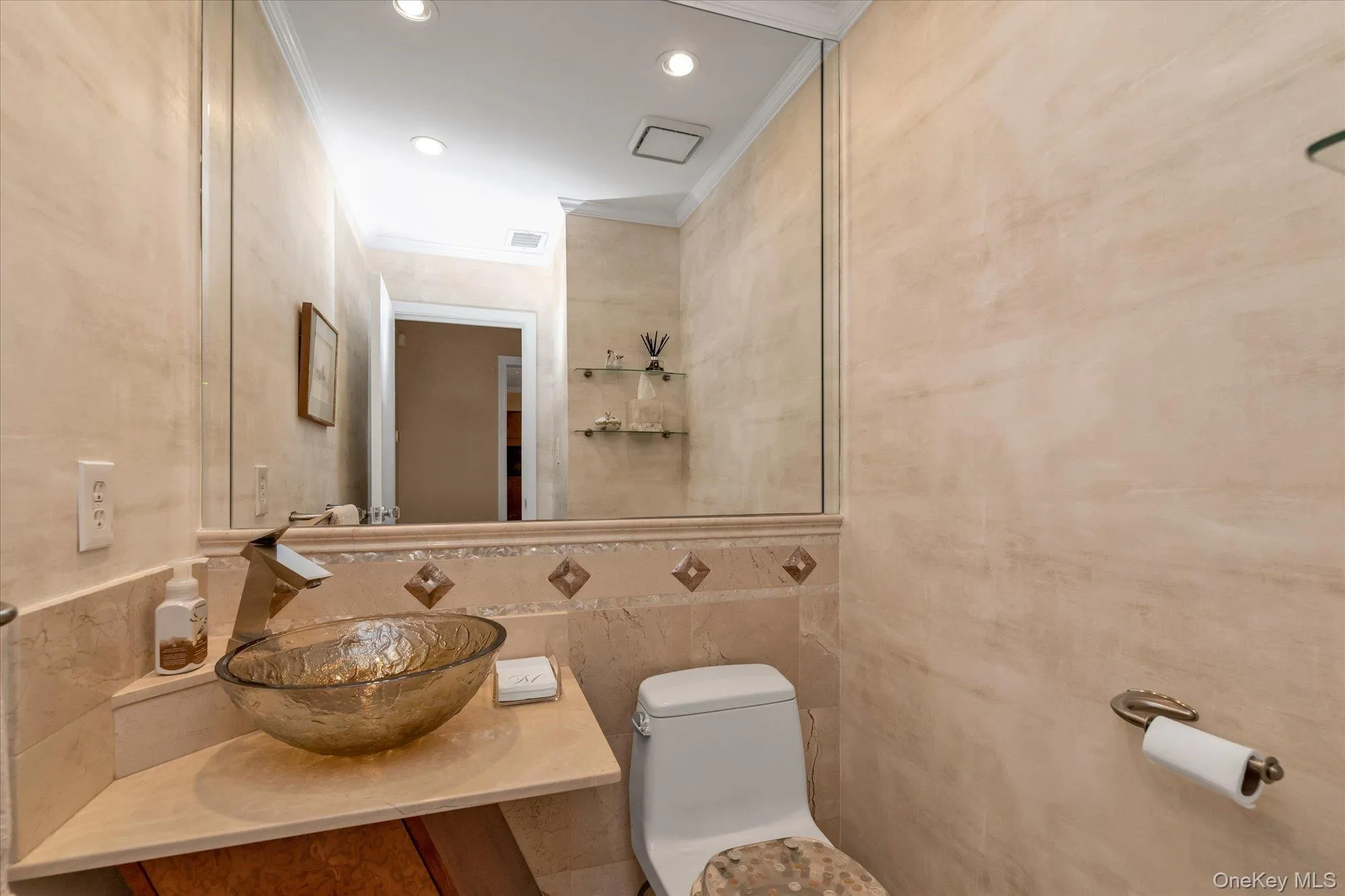 Powder room featuring a vessel sink with a contemporary faucet, a full-wall mirror, recessed lighting, and wall-mounted shelving Powder room featuring a vessel sink with a contemporary faucet, a full-wall mirror, recessed lighting, and wall-mounted shelving