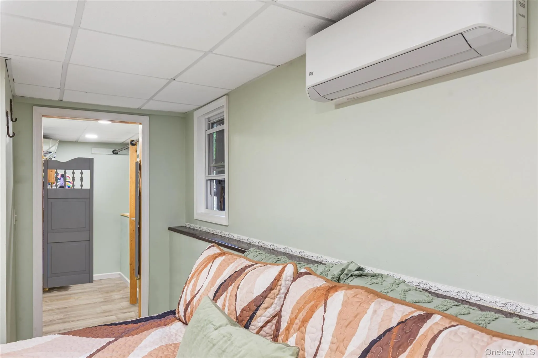 Walk in closet through double hinged swinging doors Walk in closet through double hinged swinging doors