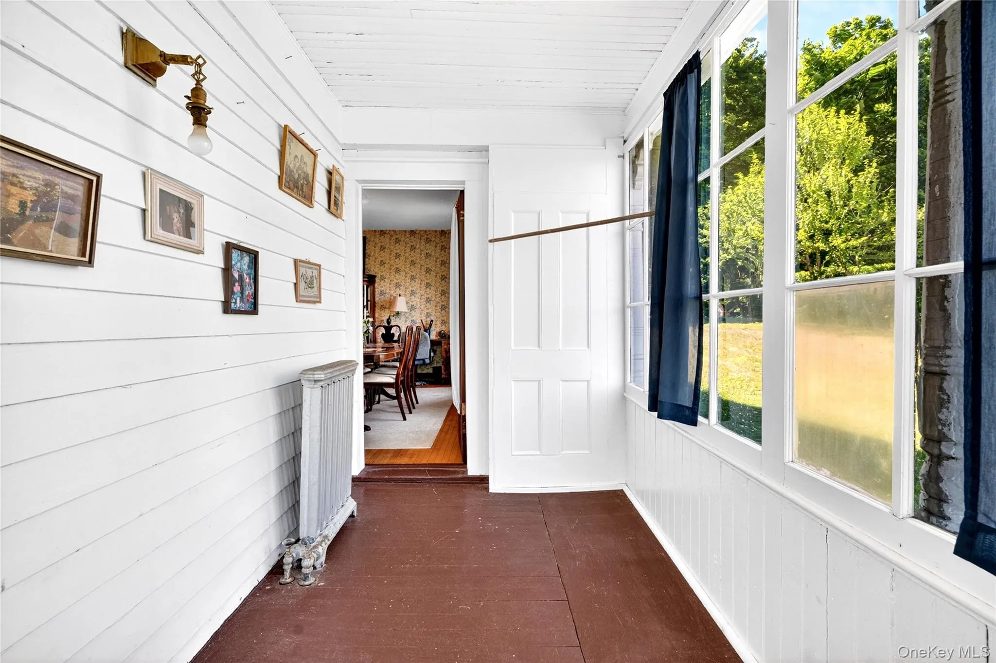 Enclosed porch off of dining room Enclosed porch off of dining room