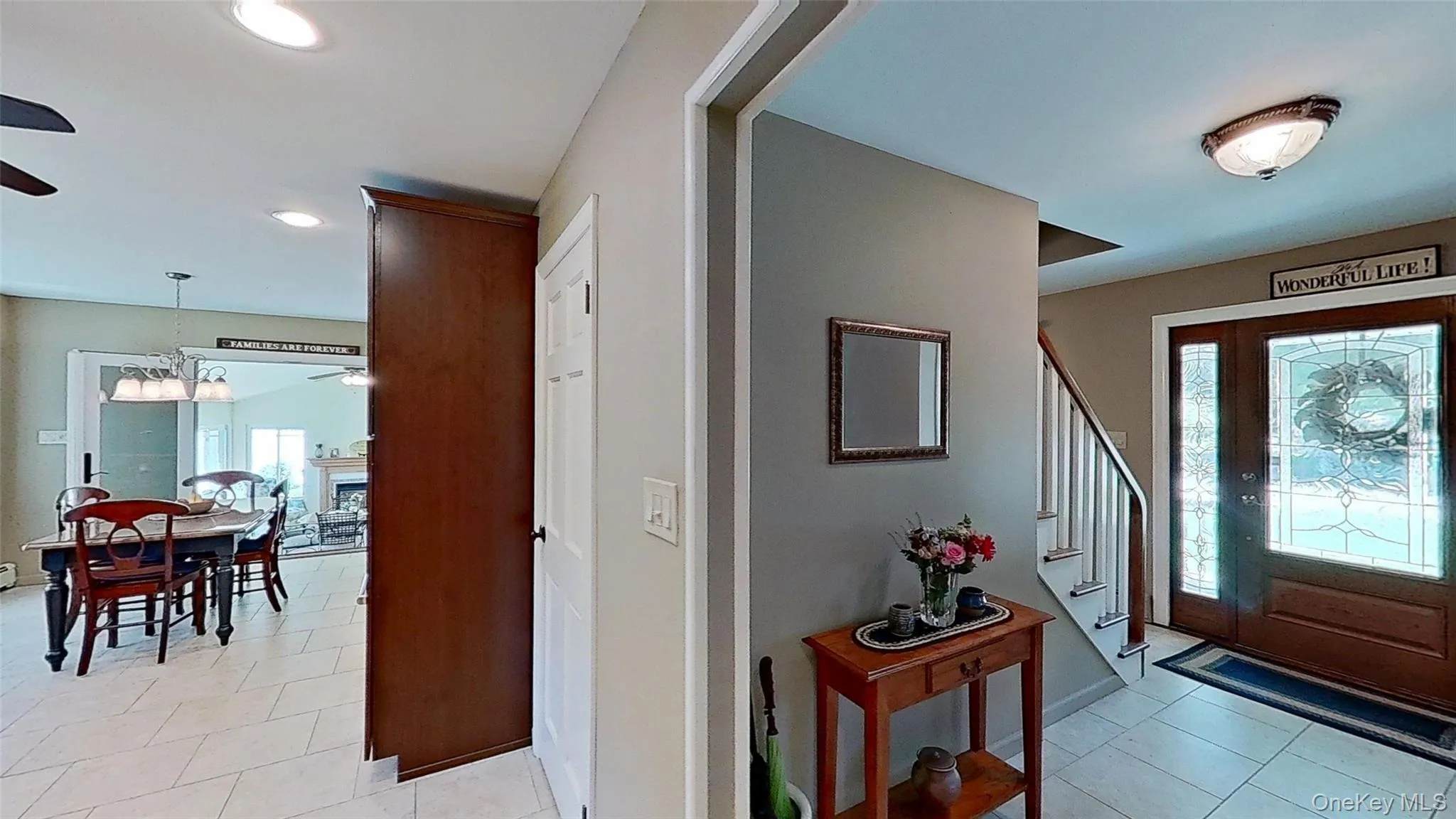 A custom front door entry, from the covered exterior front porch, welcomes all to a foyer that flows into the spacious main-floor rooms! A custom front door entry, from the covered exterior front porch, welcomes all to a foyer that flows into the spacious main-floor rooms!