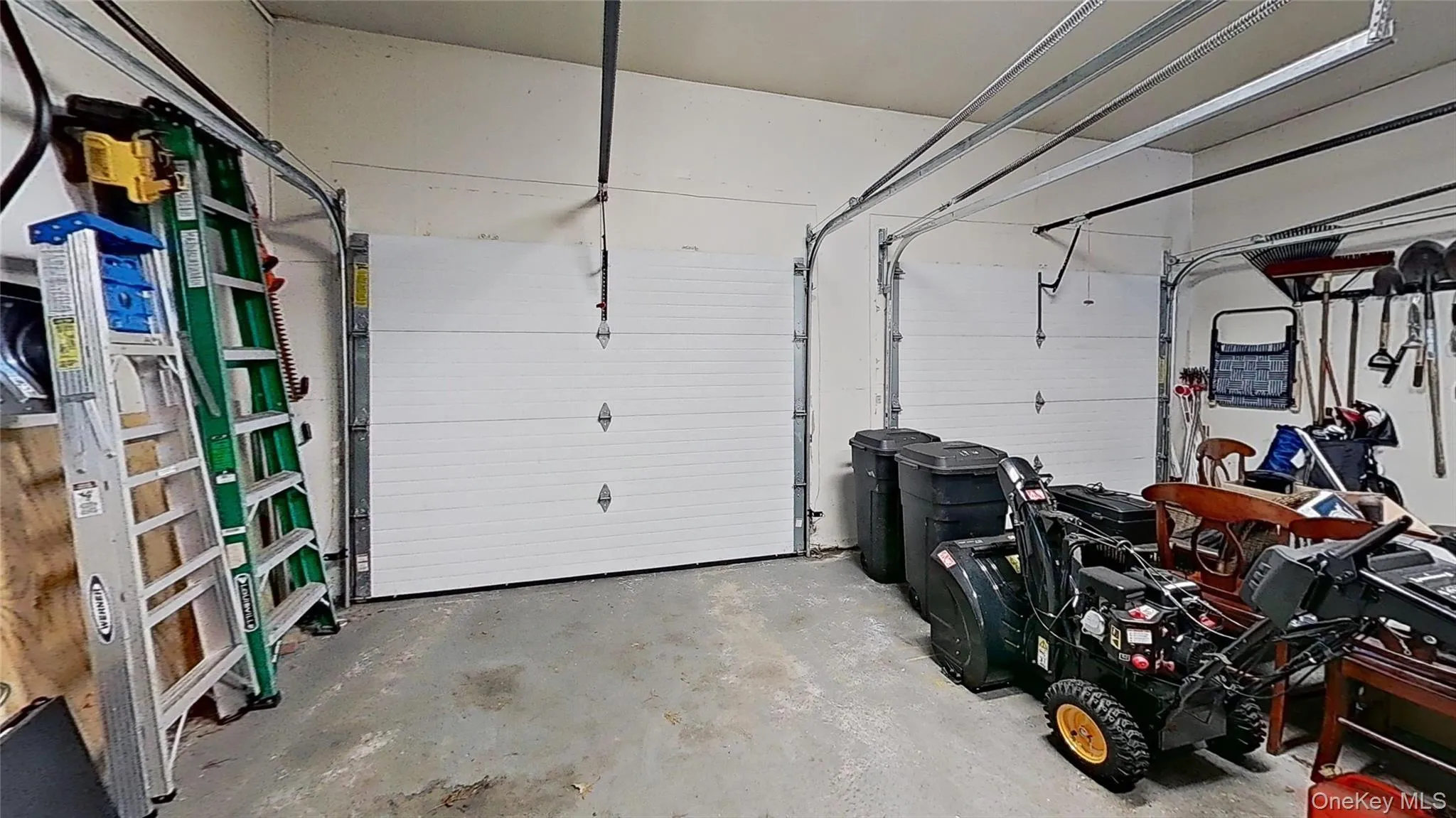 This oversized two-door garage with overflow storage space features two electric garage door openers! This oversized two-door garage with overflow storage space features two electric garage door openers!