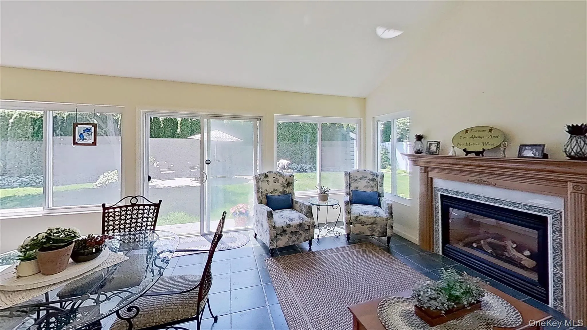 The fireplace in this relaxing sunroom setting makes this a room to enjoy in many ways, all year round ! The fireplace in this relaxing sunroom setting makes this a room to enjoy in many ways, all year round !