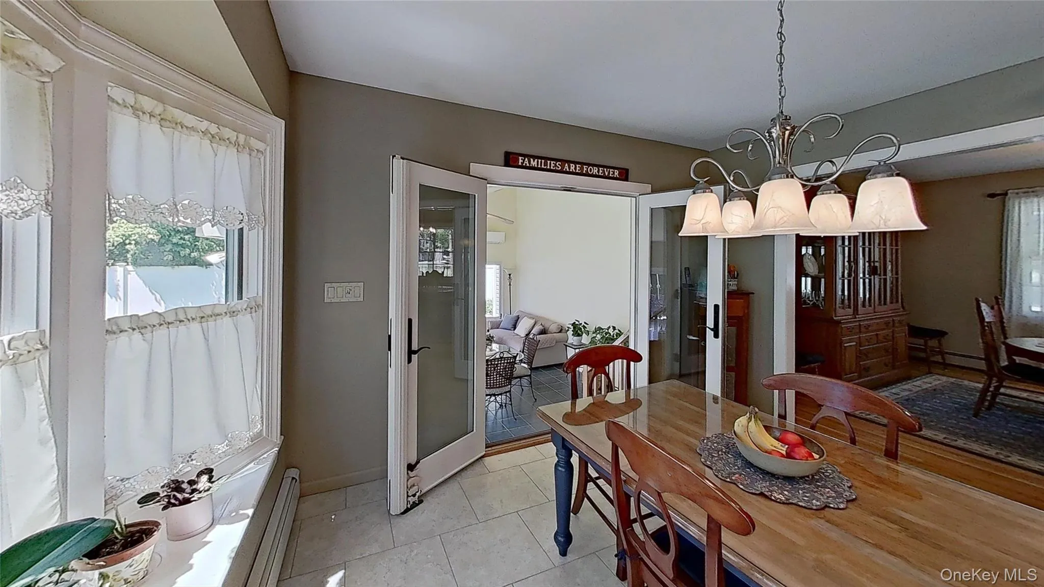 The dining room leads to the eat-in kitchen and a large adjoining sunroom! The dining room leads to the eat-in kitchen and a large adjoining sunroom!