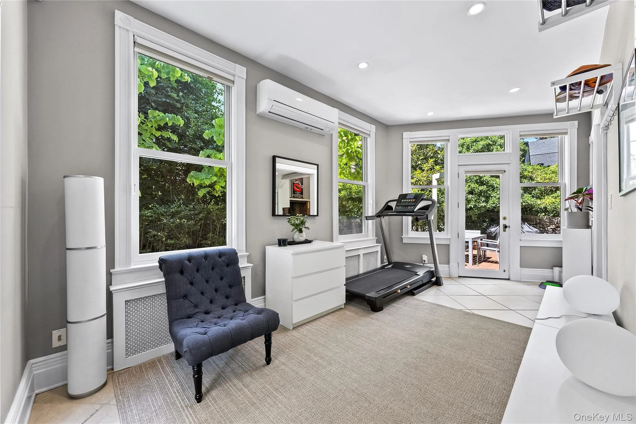 Sun room with access to back patio. Sun room with access to back patio.