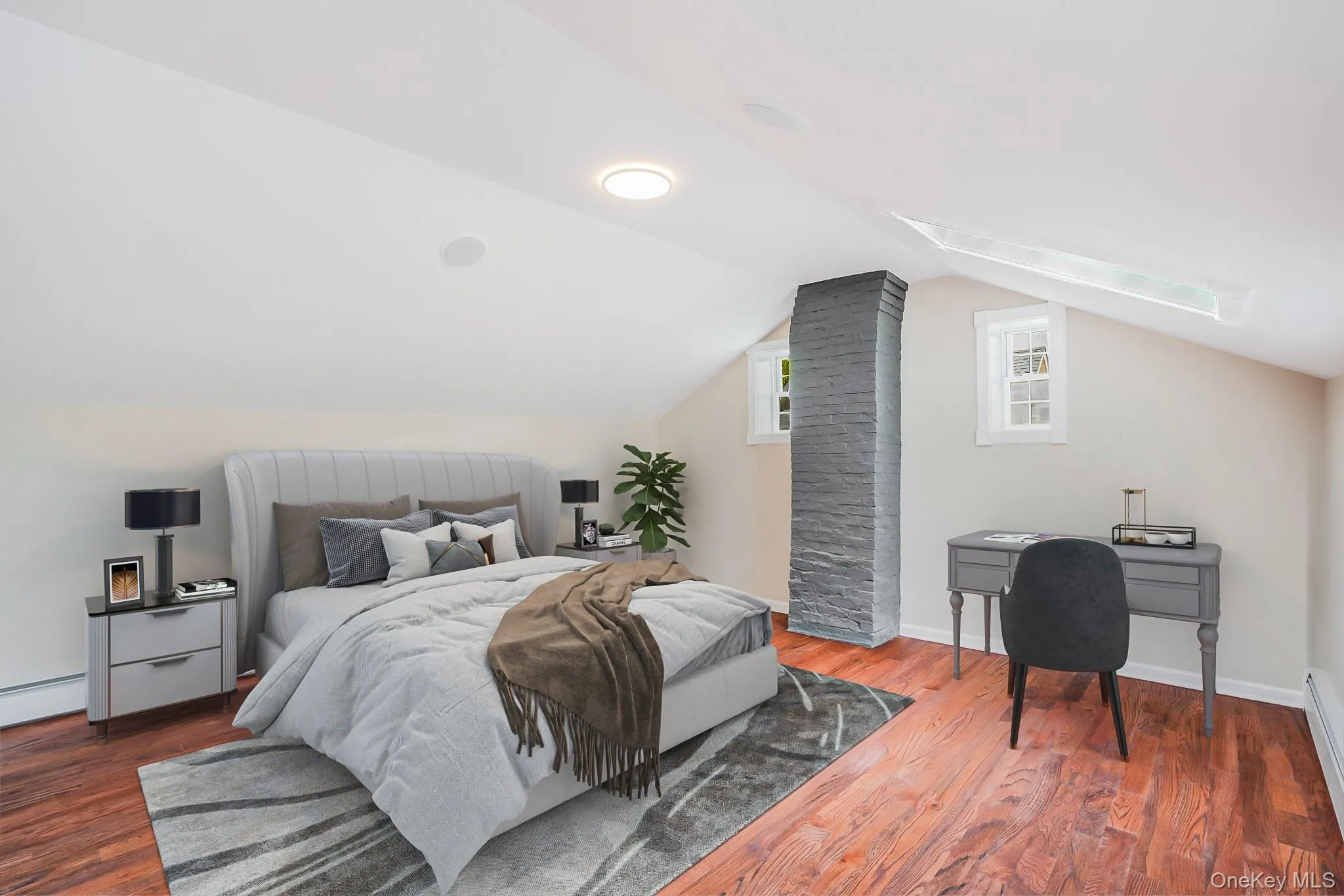 Attic space featuring rich wood-finish flooring, a prominent stone-clad chimney, and recessed ceiling lighting Attic space featuring rich wood-finish flooring, a prominent stone-clad chimney, and recessed ceiling lighting
