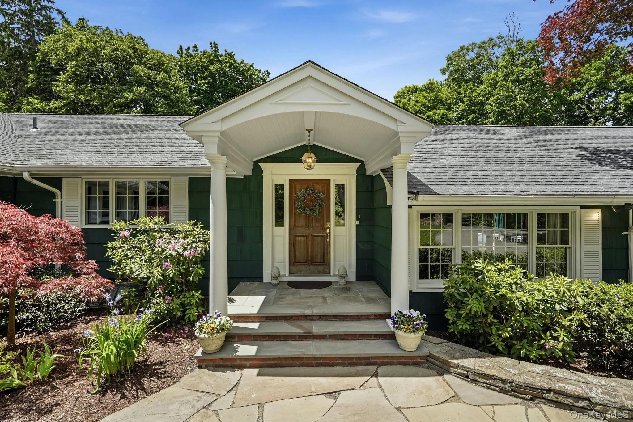 Covered front porch welcomes you. Covered front porch welcomes you.