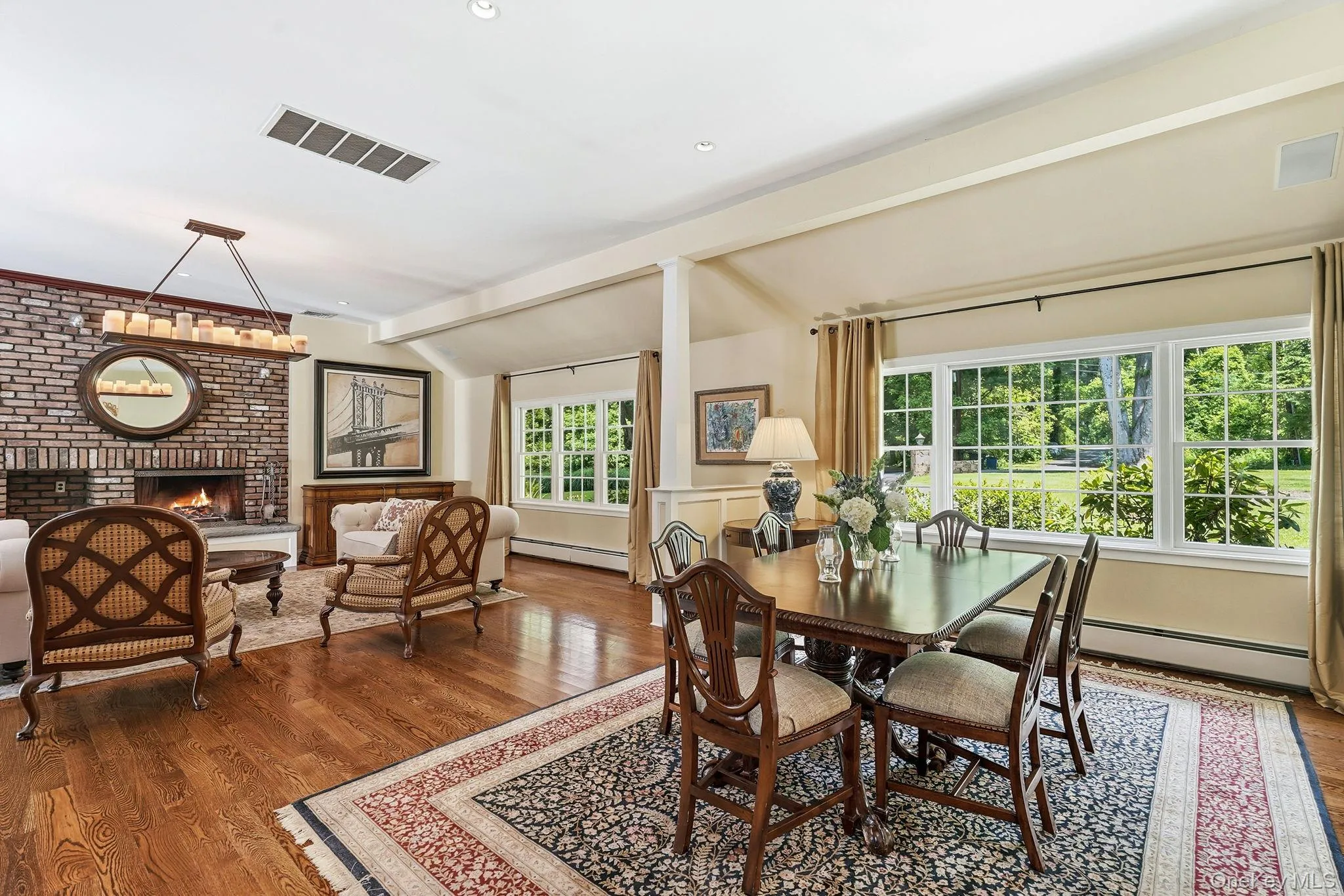 Formal dining area portraying the incredible use of windows in the home. Formal dining area portraying the incredible use of windows in the home.