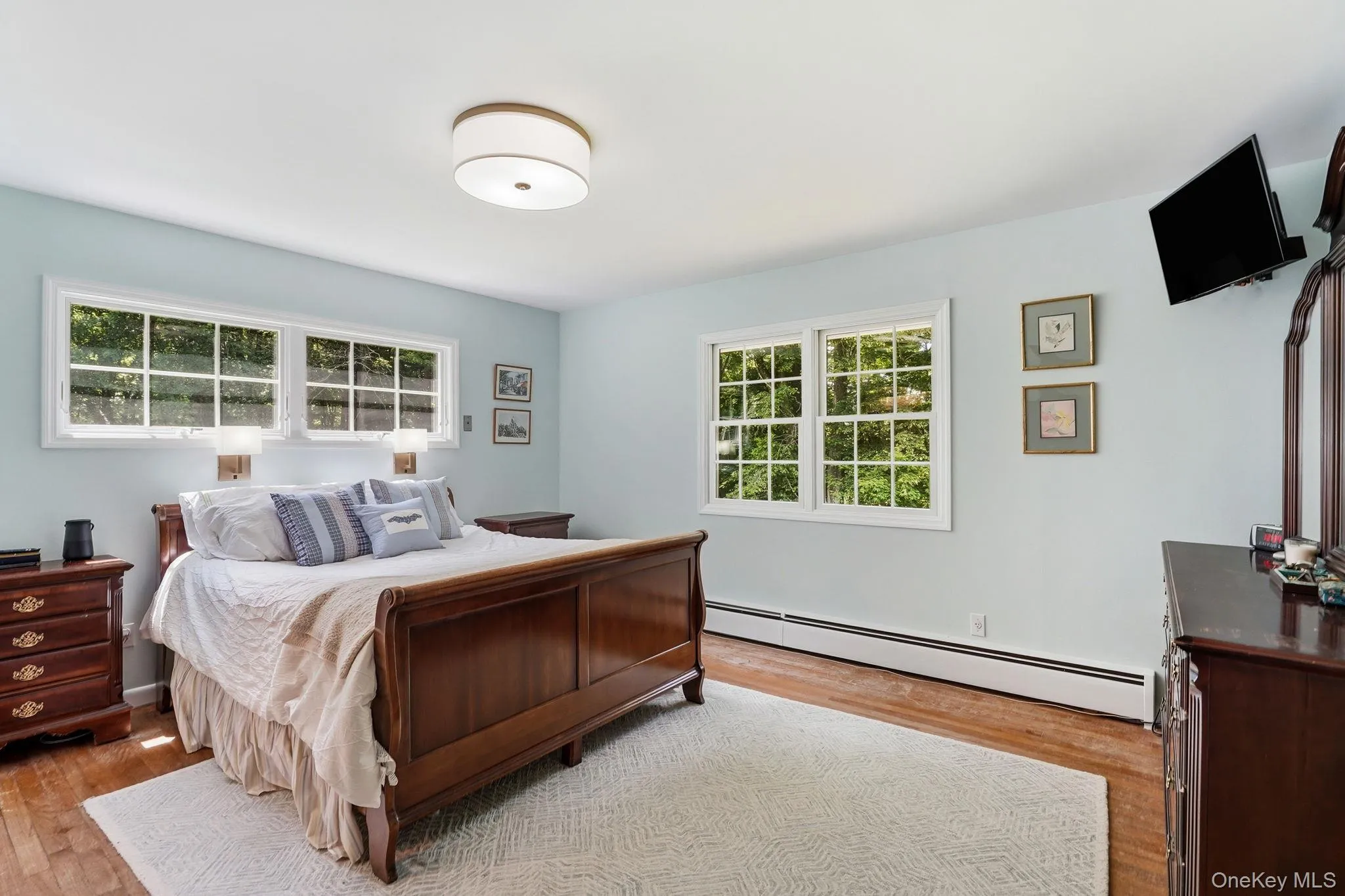 Primary bedroom with abundant natural light. Primary bedroom with abundant natural light.