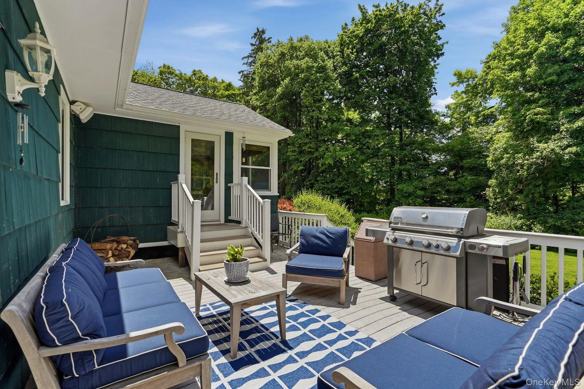 Convenient grilling from your private deck overlooking the two acre spread. Convenient grilling from your private deck overlooking the two acre spread.