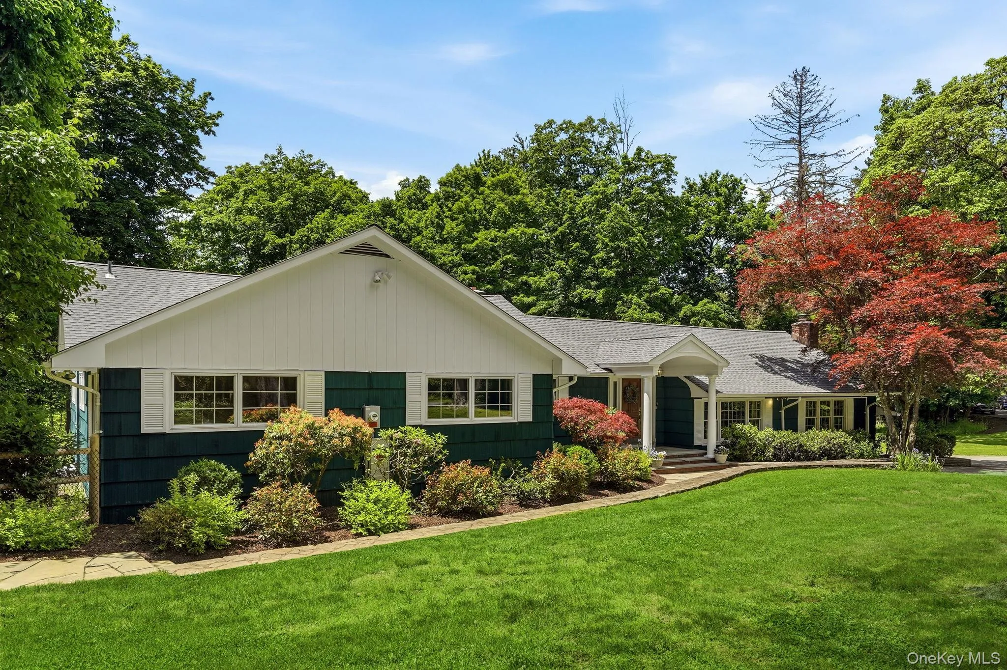 Elegant specimen shrubs and elegant perennial plantings. Elegant specimen shrubs and elegant perennial plantings.