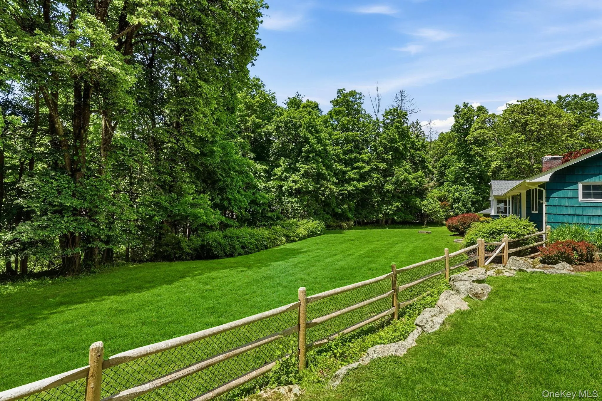 Bucolic split rail fence leading to the pool. Bucolic split rail fence leading to the pool.