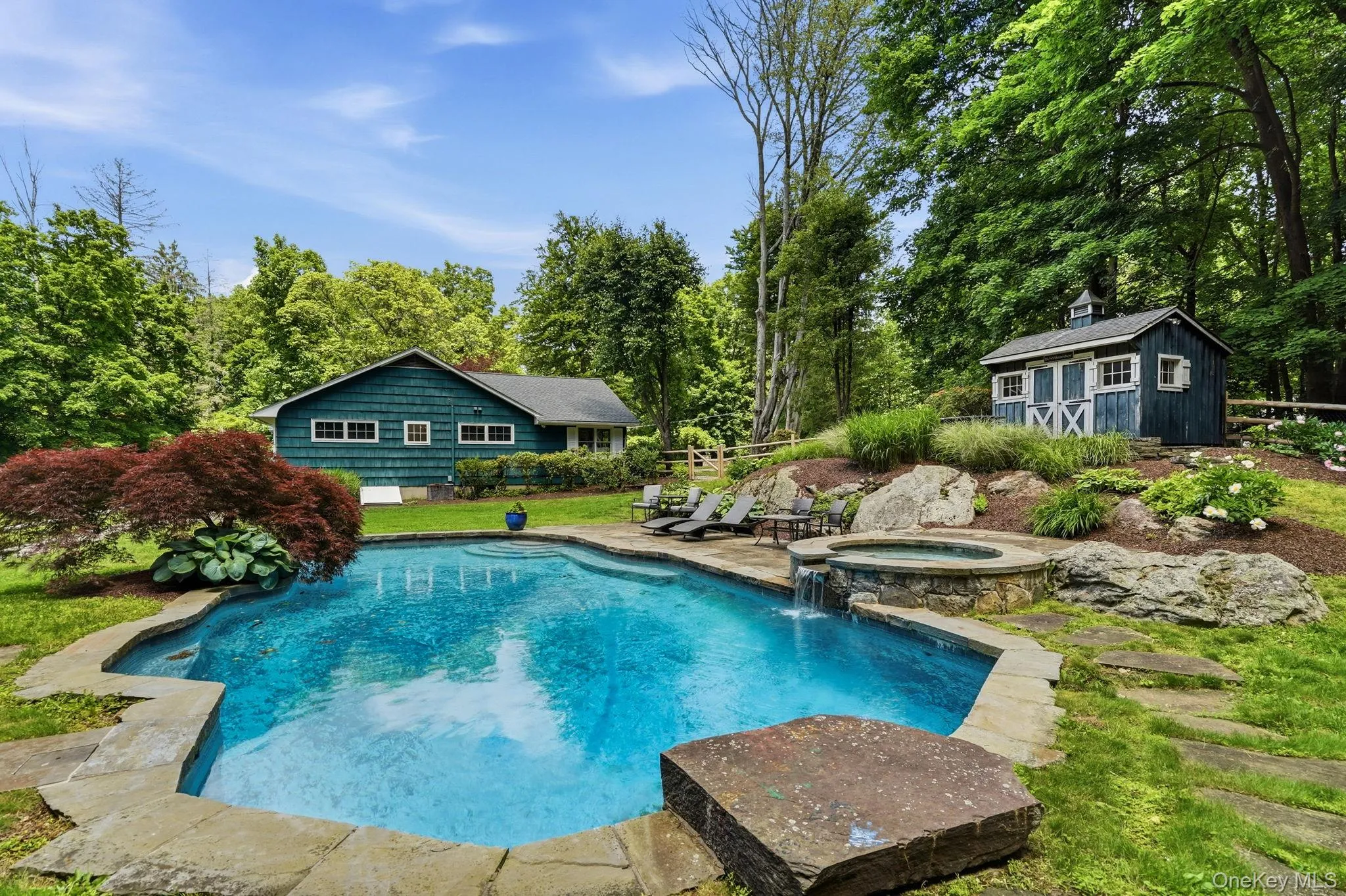 Photo showing pool cabana and diving rock. Photo showing pool cabana and diving rock.