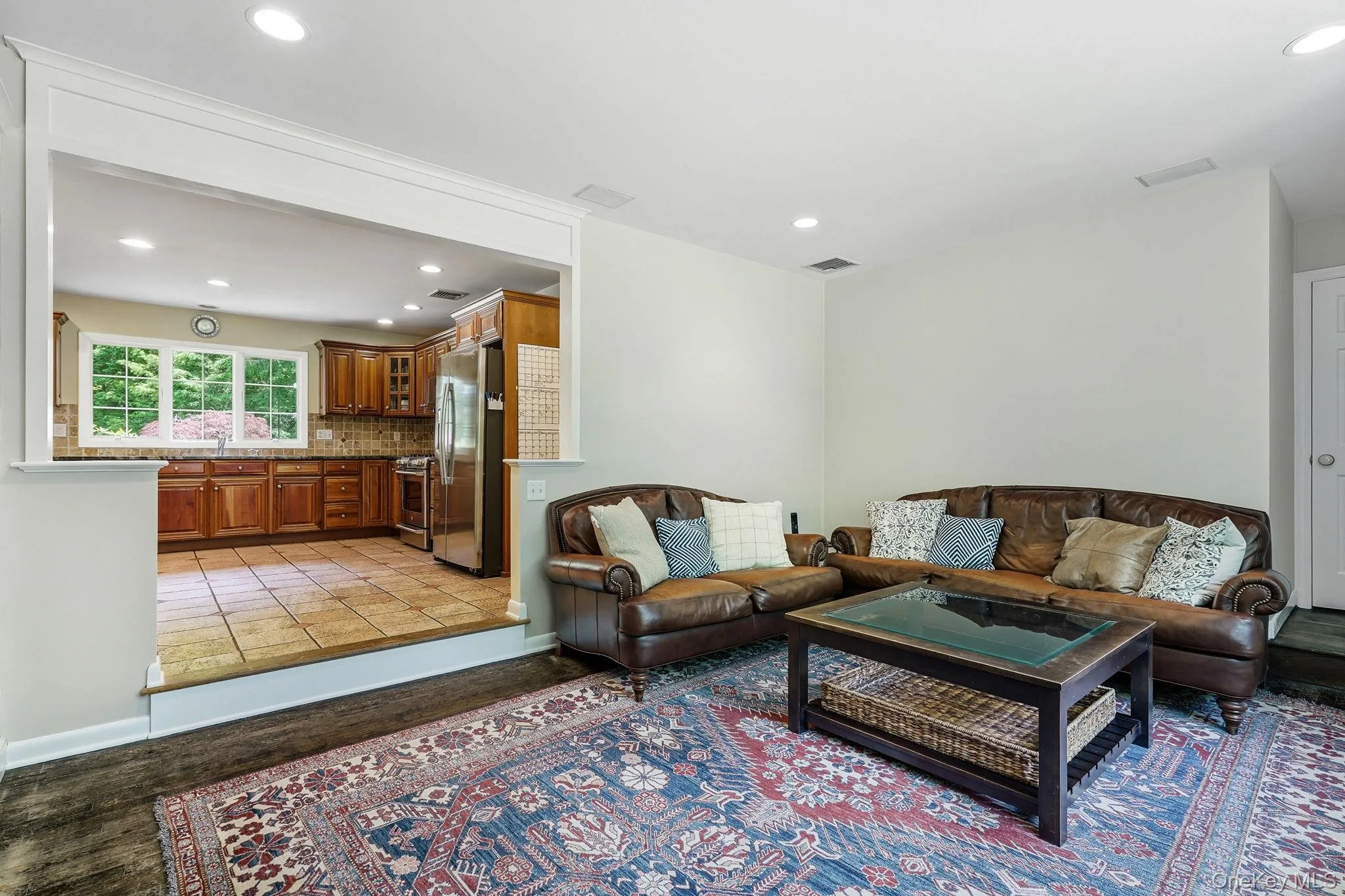 Another angle of family room showing open doorway to kitchen. Another angle of family room showing open doorway to kitchen.