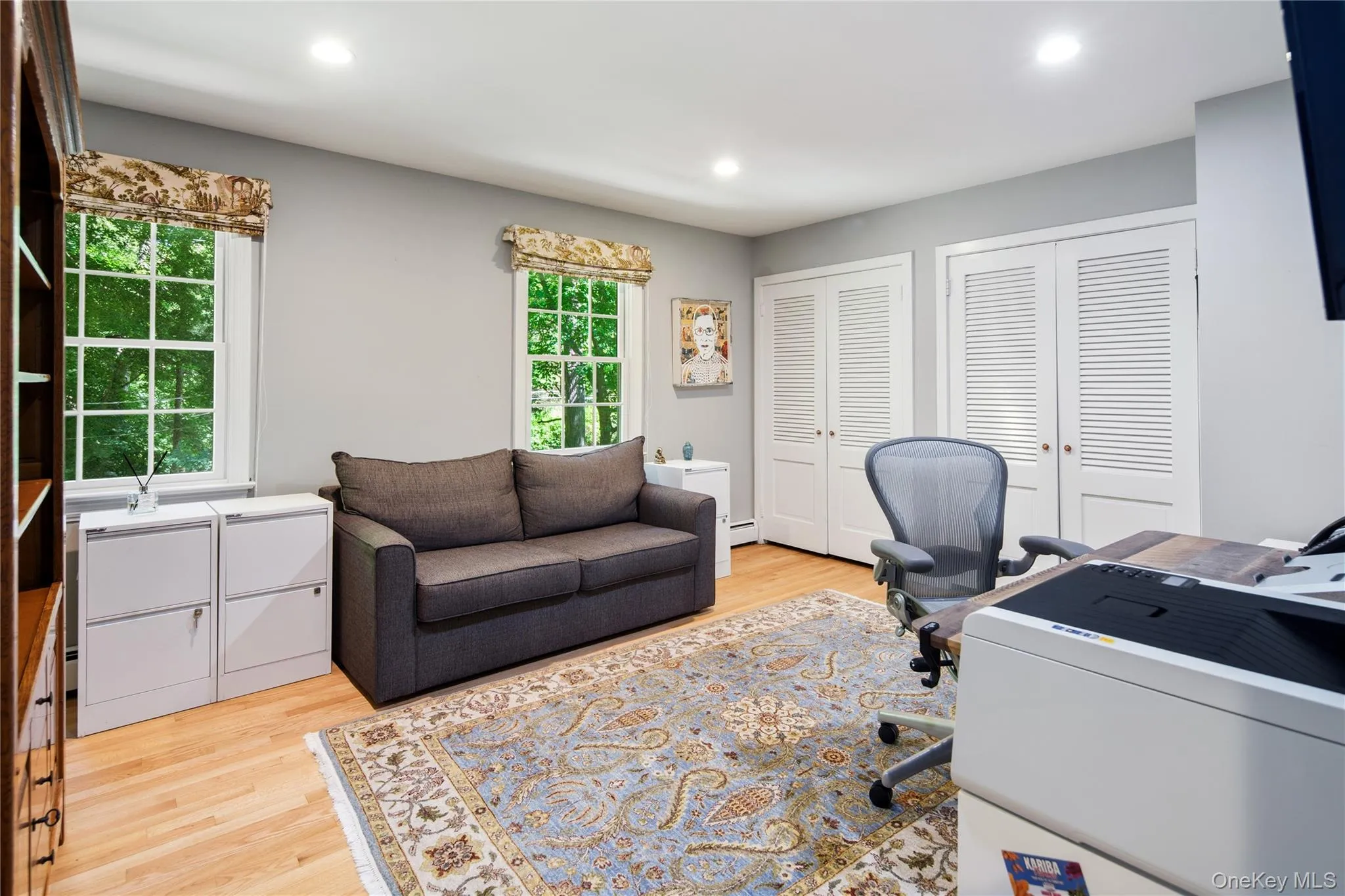Bedroom 4 (currently being used as a home office) has two double closes, oak hardwood floors, crown molding and recessed lighting Bedroom 4 (currently being used as a home office) has two double closes, oak hardwood floors, crown molding and recessed lighting
