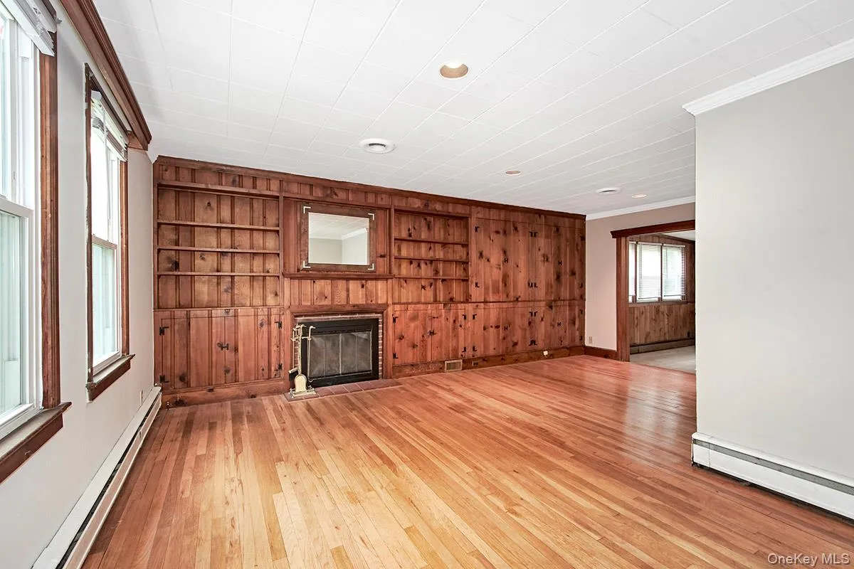 Beautiful, paneled fireplace Beautiful, paneled fireplace
