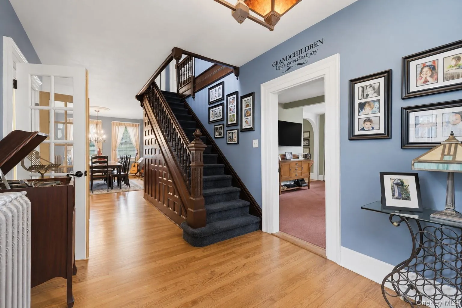 Entry with beautiful original wood stairs Entry with beautiful original wood stairs