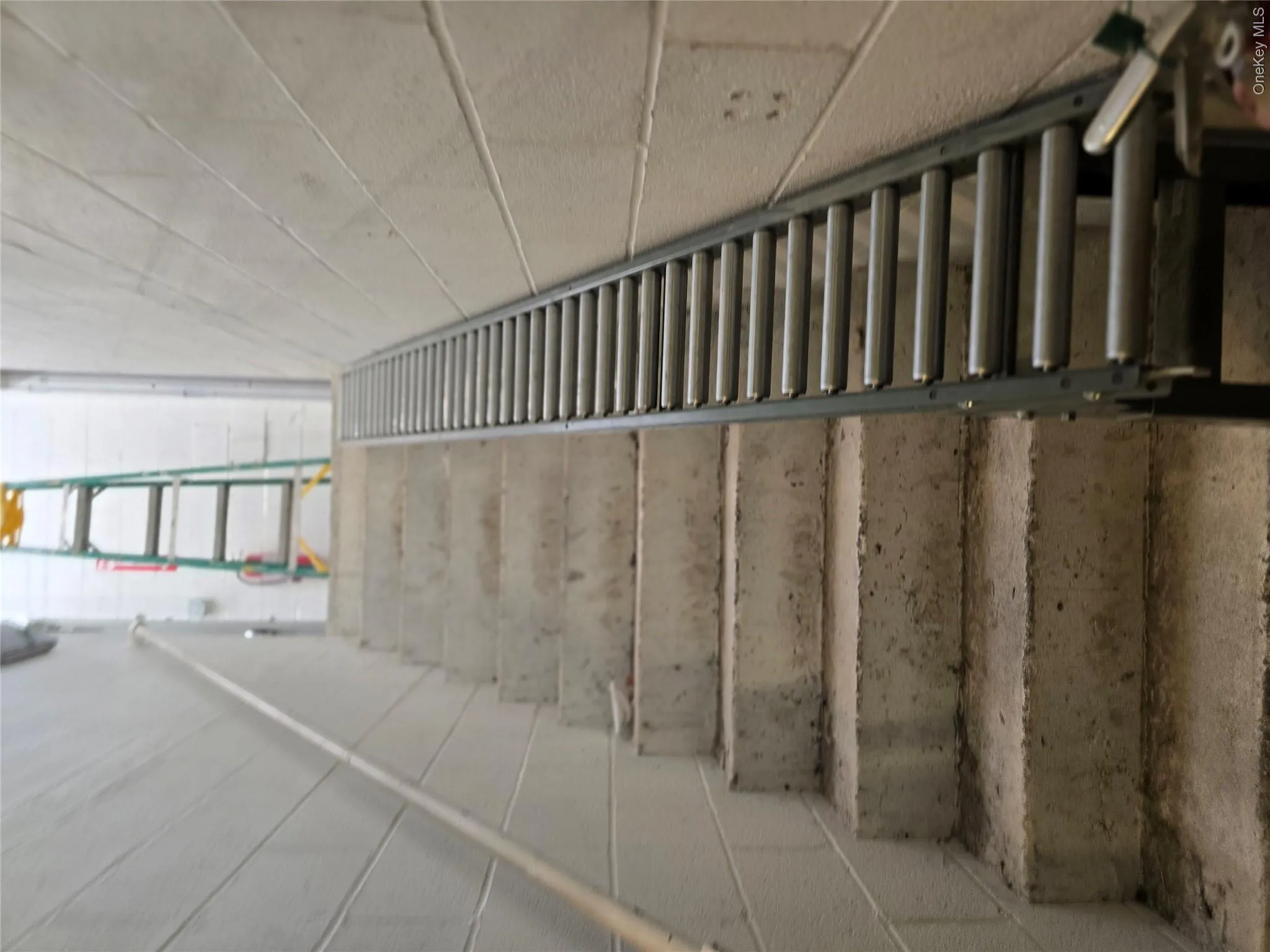 Stairs featuring concrete block wall Stairs featuring concrete block wall
