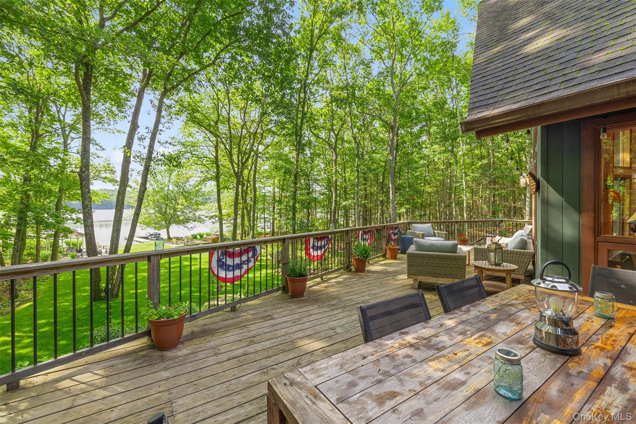 Deck with a yard and outdoor lounge area Deck with a yard and outdoor lounge area