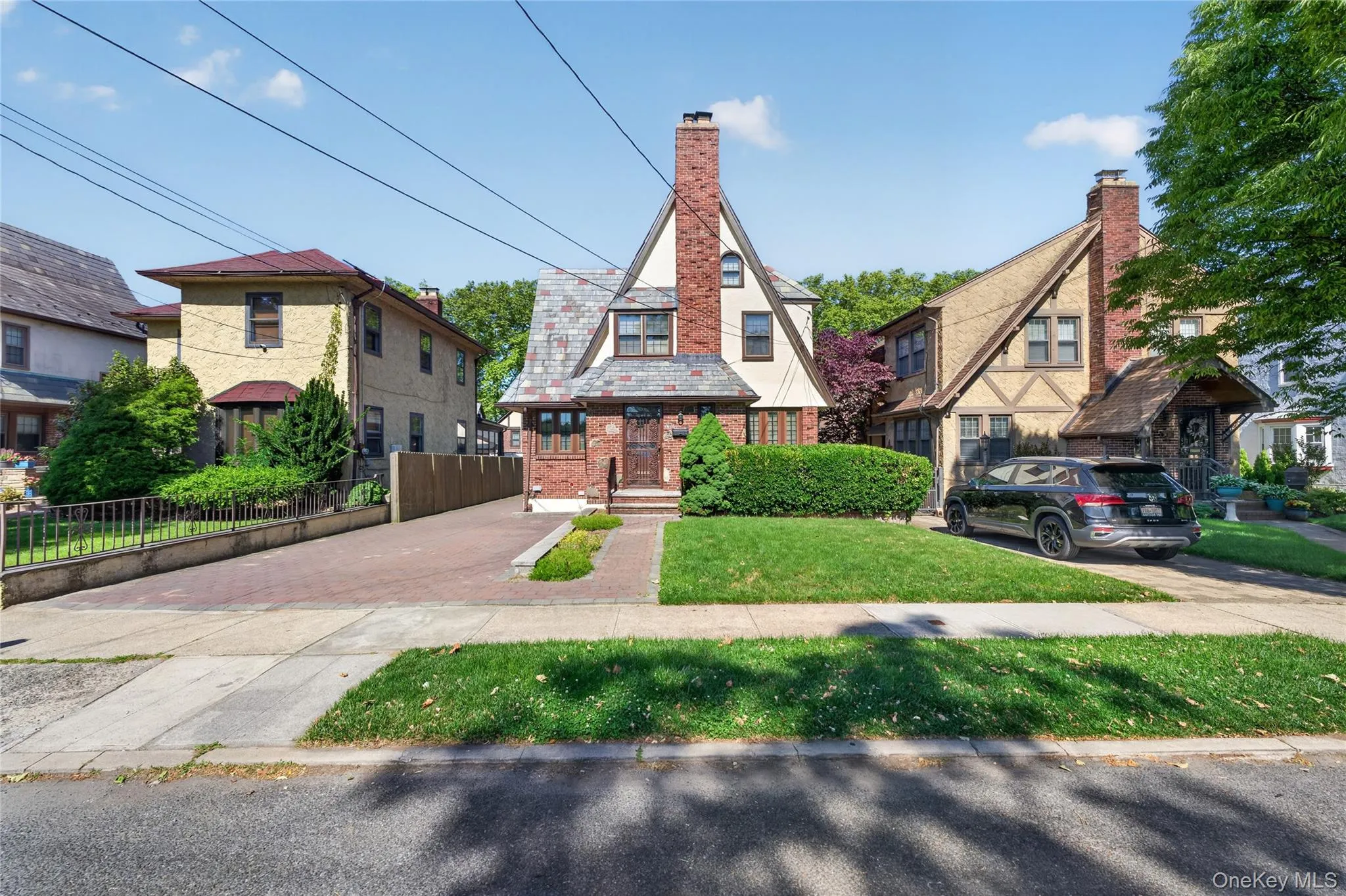 Distinctive architectural character featuring a brick facade with a slate roof Distinctive architectural character featuring a brick facade with a slate roof