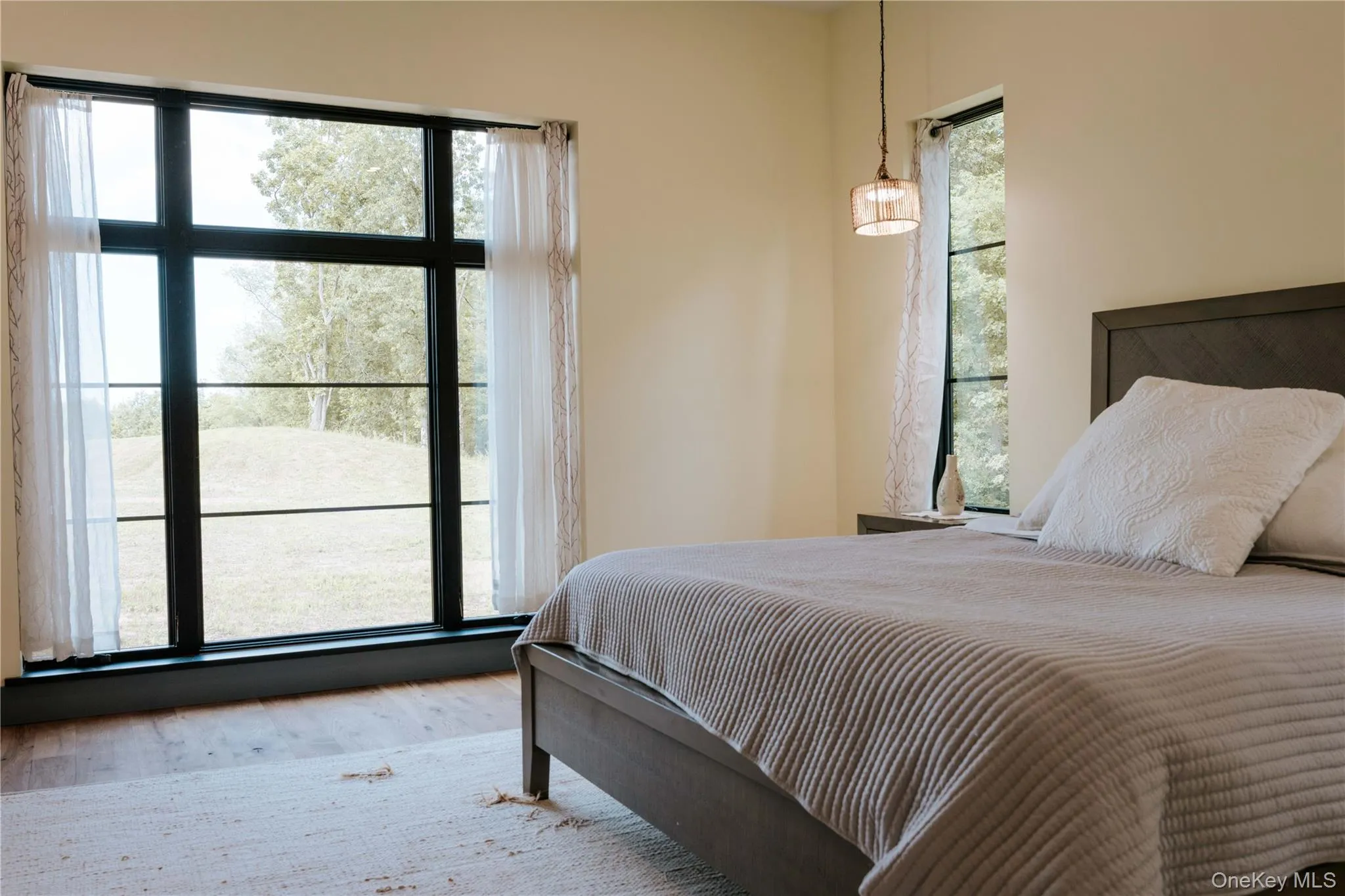 Bedroom with wood finished floors Bedroom with wood finished floors