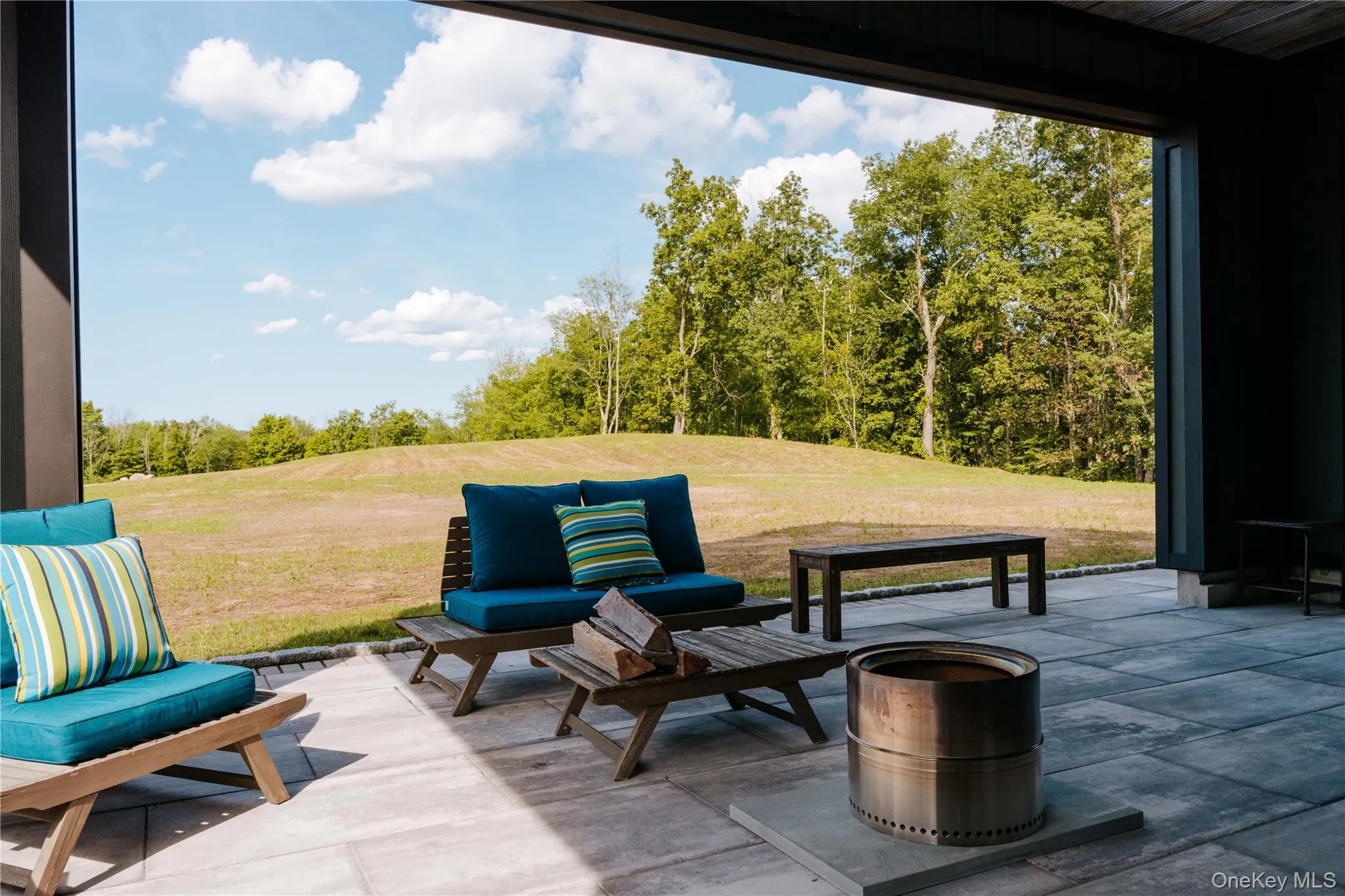 View of patio / terrace with view of scattered trees View of patio / terrace with view of scattered trees