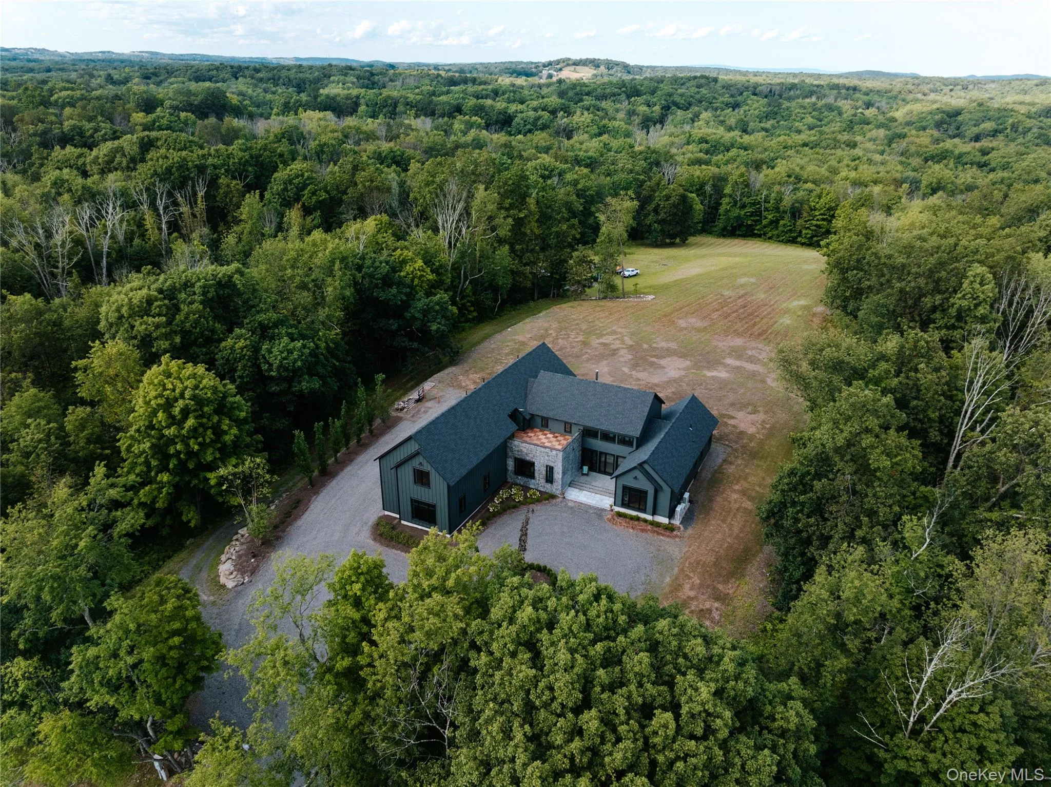 View of subject property featuring a forest View of subject property featuring a forest