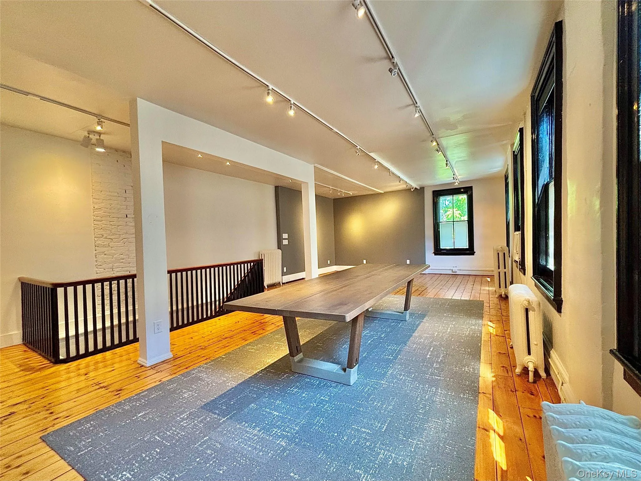 Track lighting and conference table Track lighting and conference table