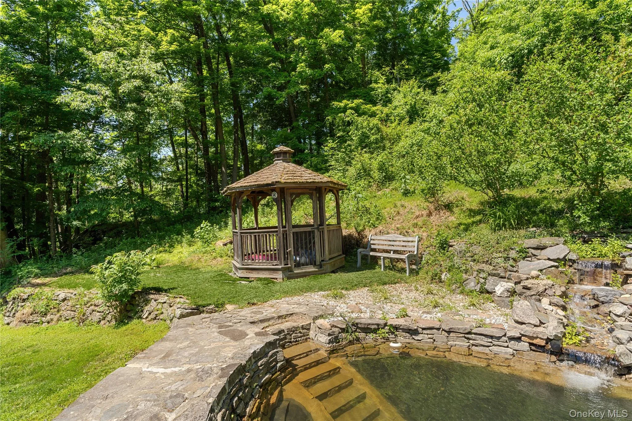 Side shot of pond and gazebo Side shot of pond and gazebo