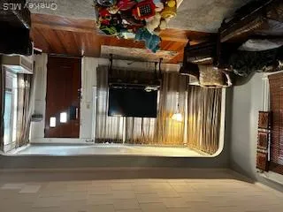 Living room featuring wood finished floors Living room featuring wood finished floors