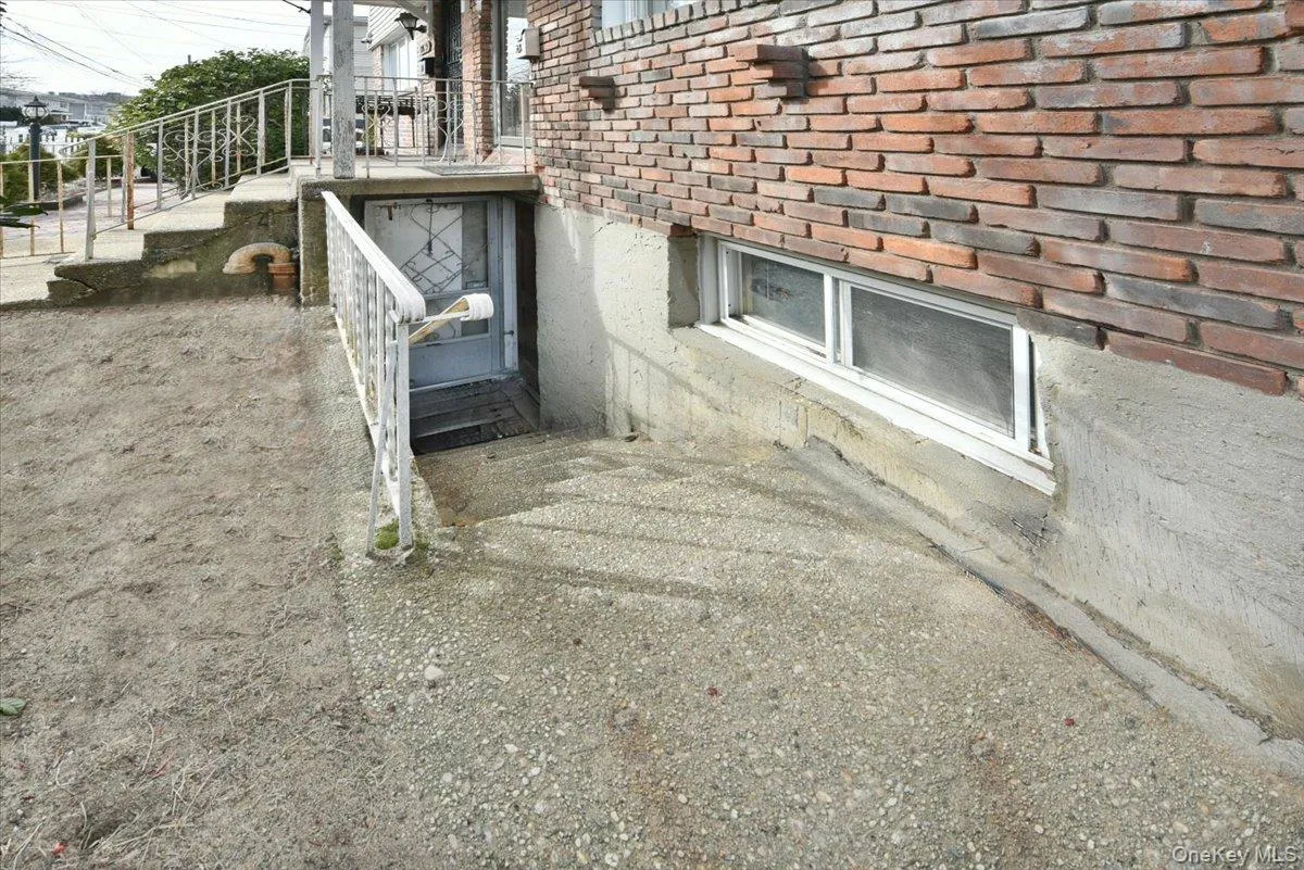 View of side of property featuring brick siding View of side of property featuring brick siding