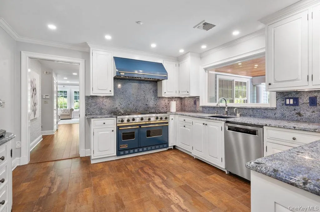 Chef's kitchen with Viking Range and Subzero refrigerator. Chef's kitchen with Viking Range and Subzero refrigerator.