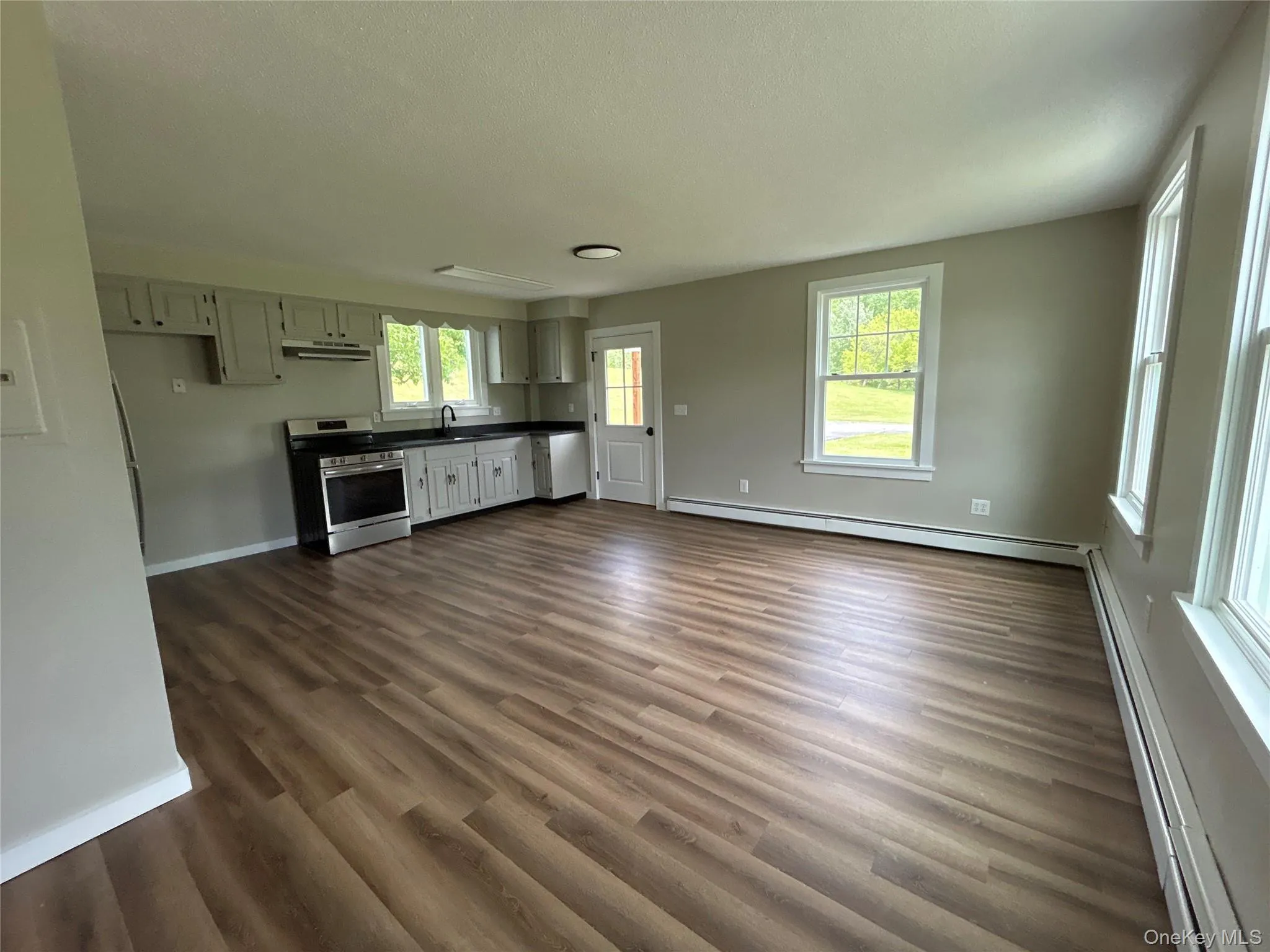 First floor #2 apartment open concept kitchen, living and dining room First floor #2 apartment open concept kitchen, living and dining room