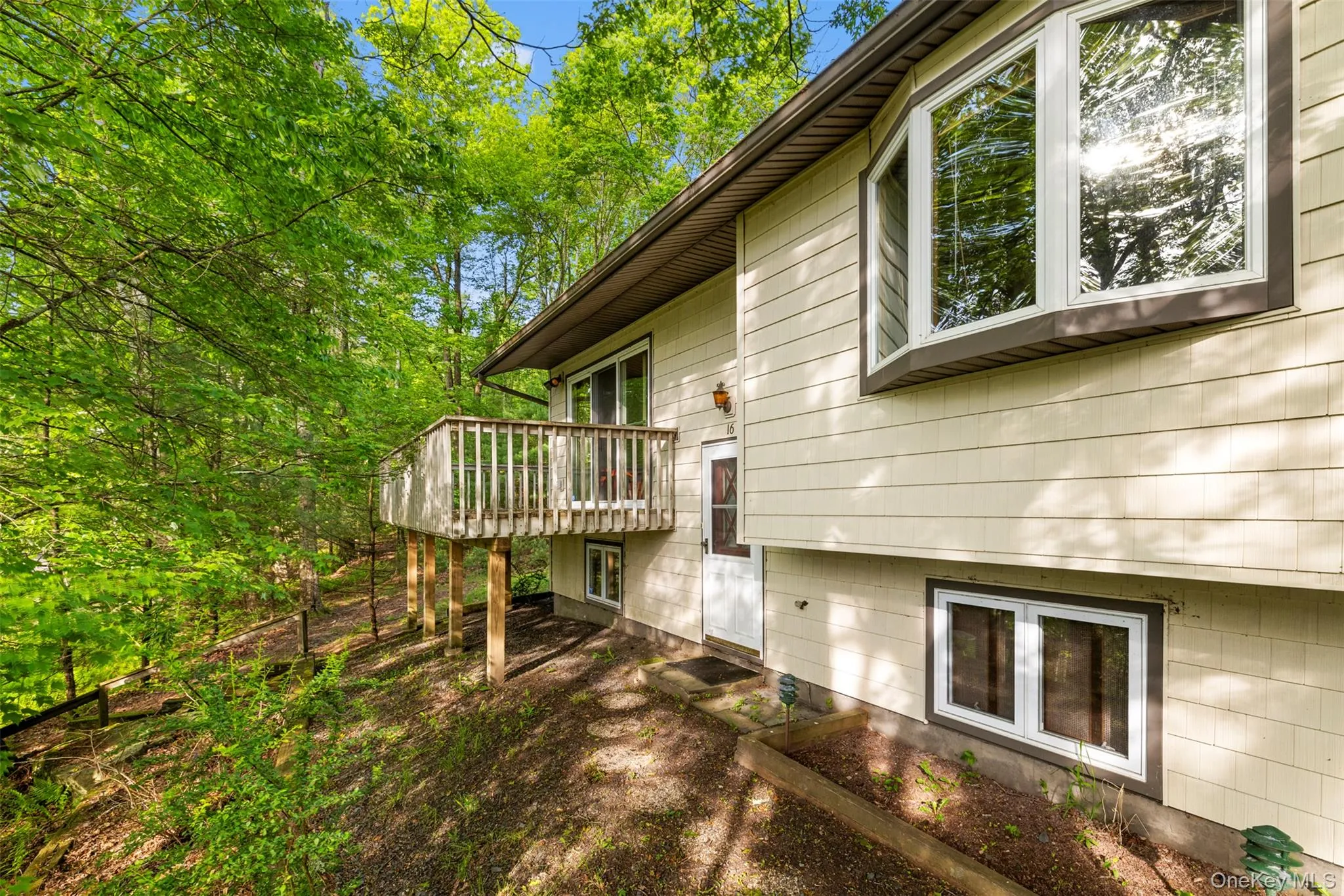 View of side of property featuring a deck View of side of property featuring a deck