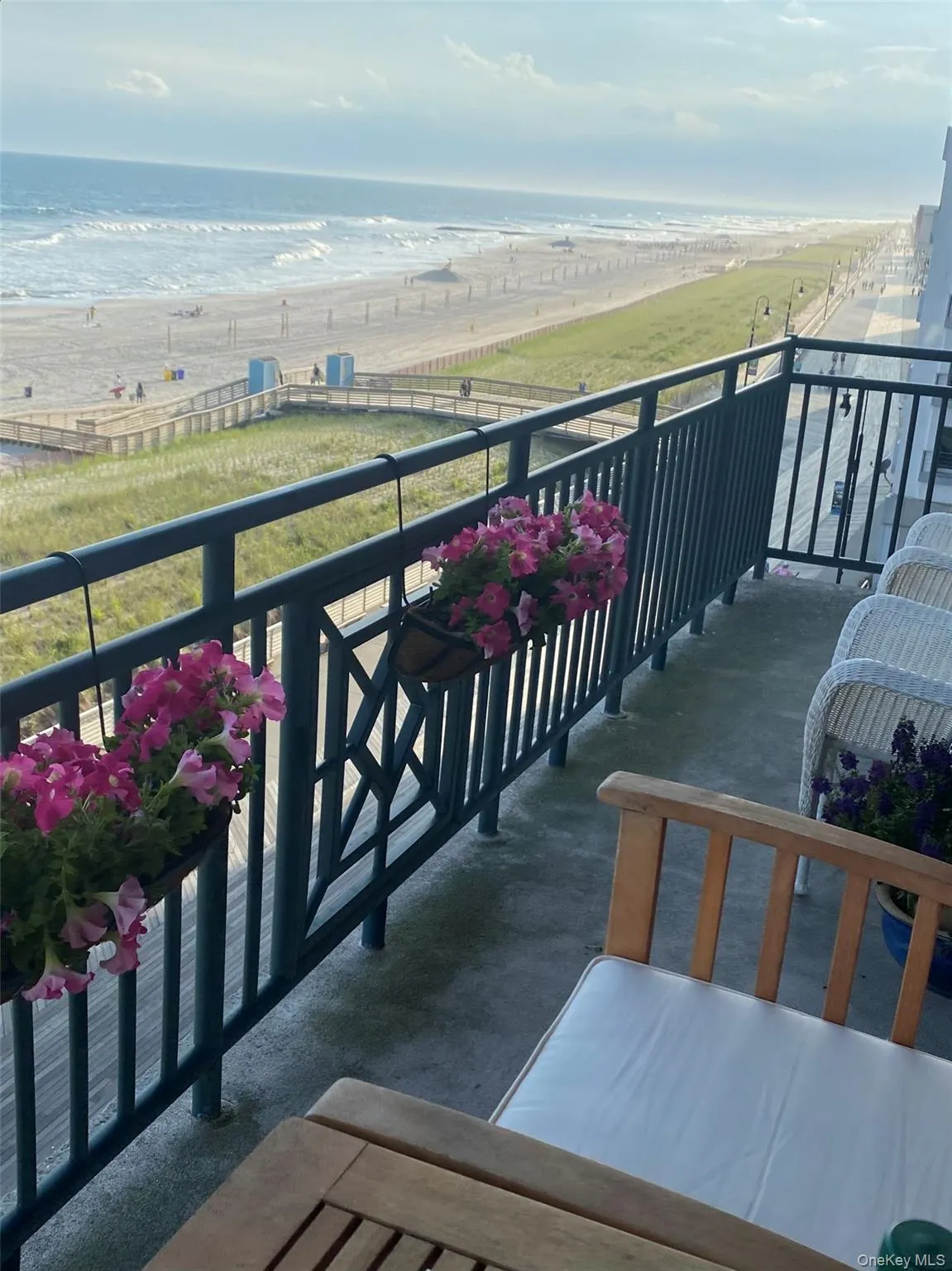 Balcony with a water view and a beach view Balcony with a water view and a beach view