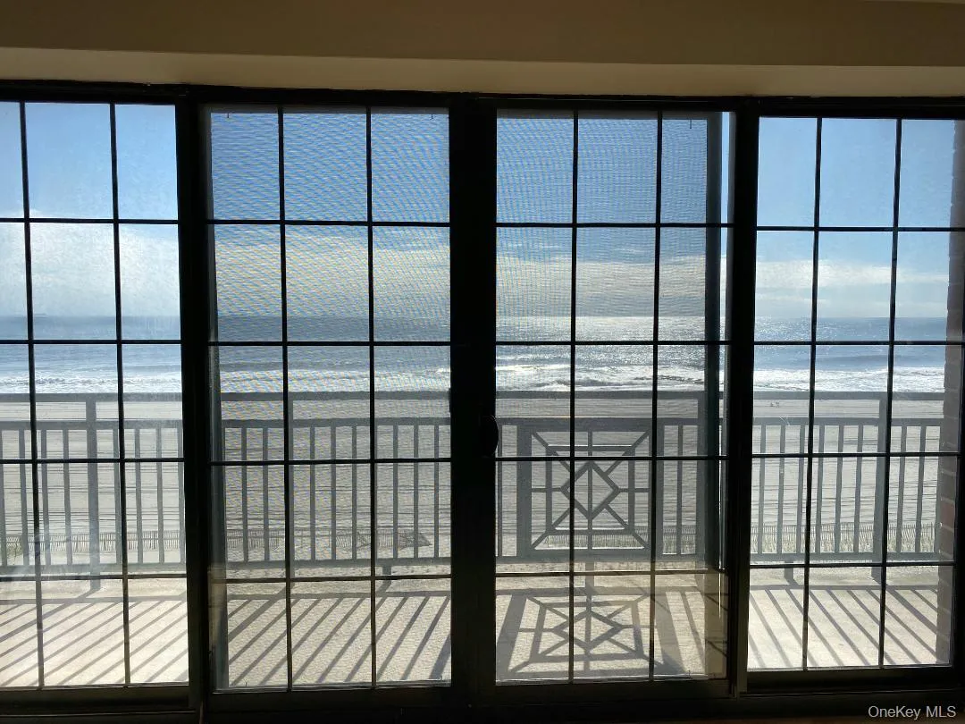Interior details featuring a water view and a beach view Interior details featuring a water view and a beach view