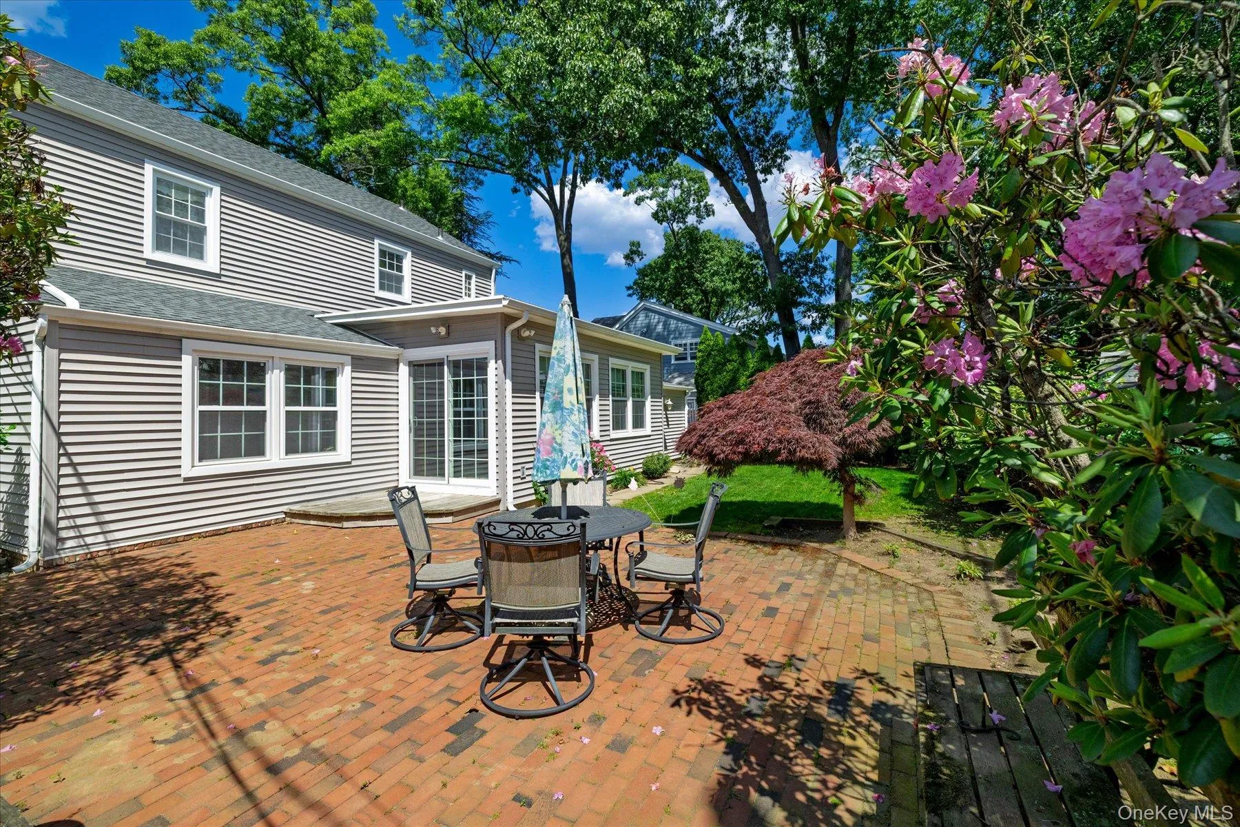 Rear View of Patio & Deck. Rear View of Patio & Deck.