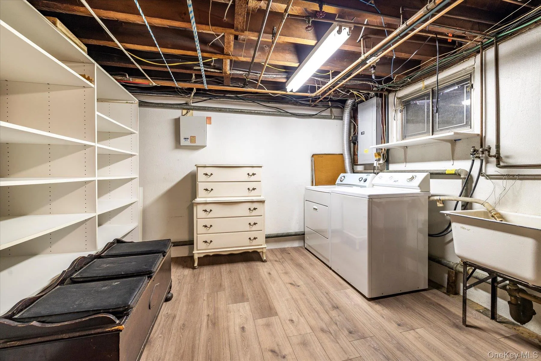 Utility room features washer, dryer, gas burner and hot water heater. Plus, shelving for your Costco or BJ's items. Utility room features washer, dryer, gas burner and hot water heater. Plus, shelving for your Costco or BJ's items.
