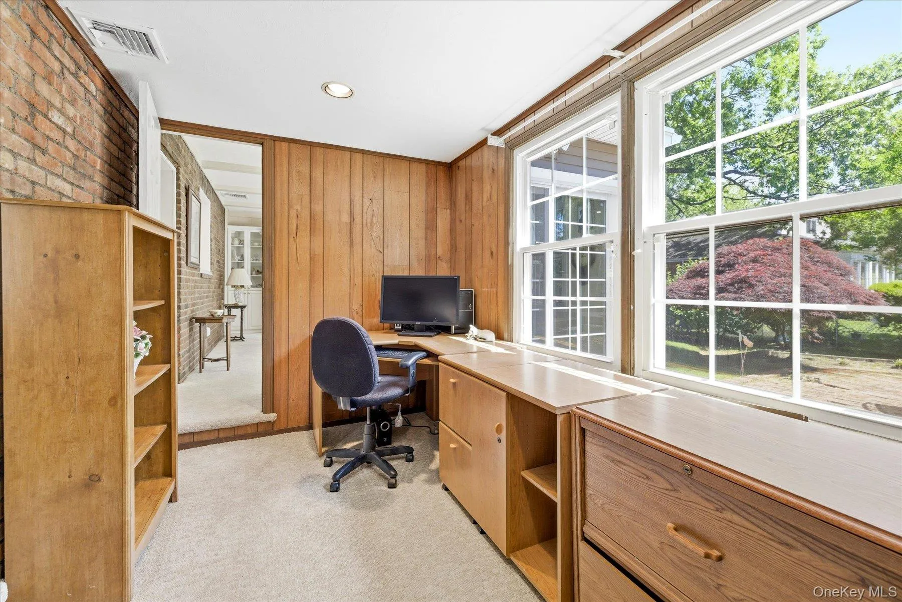 The office sits between the living room and family room. The office sits between the living room and family room.